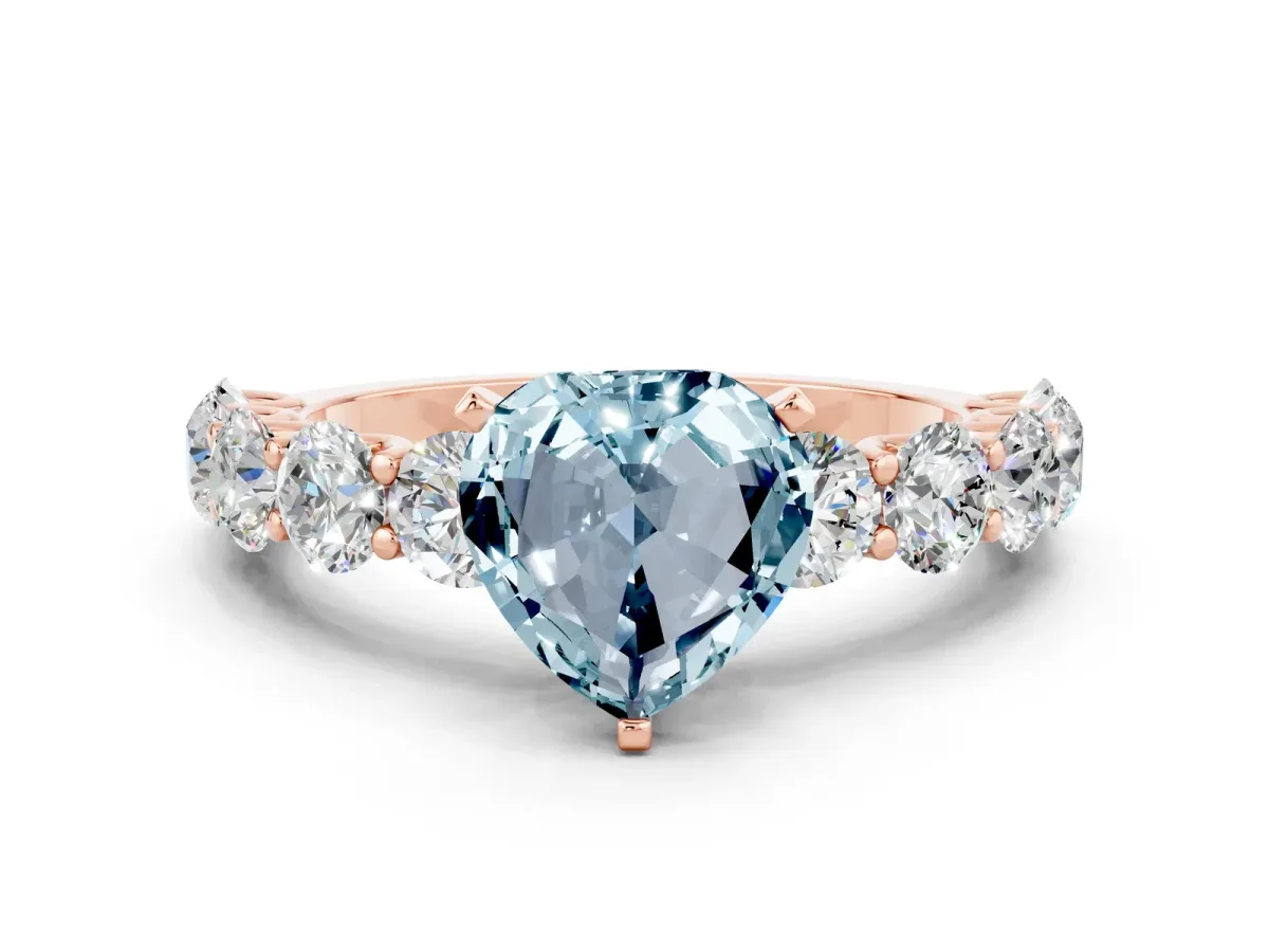 Heart Cut Aquamarine Prong Setting with Side Stones on a Pave Band Rose gold