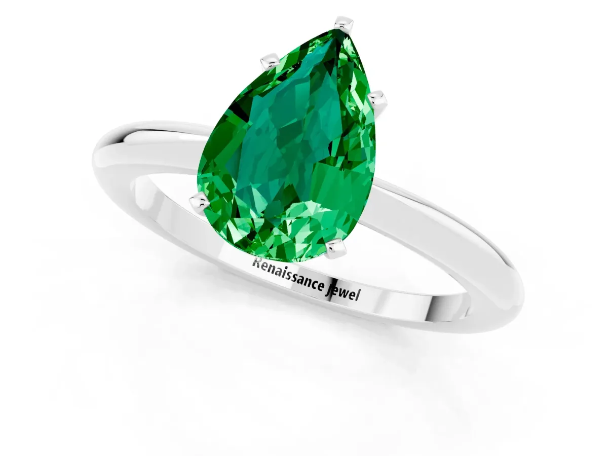 Pear Cut Emerald Solitaire Ring with Six-Prong Setting and Classic Band Silver