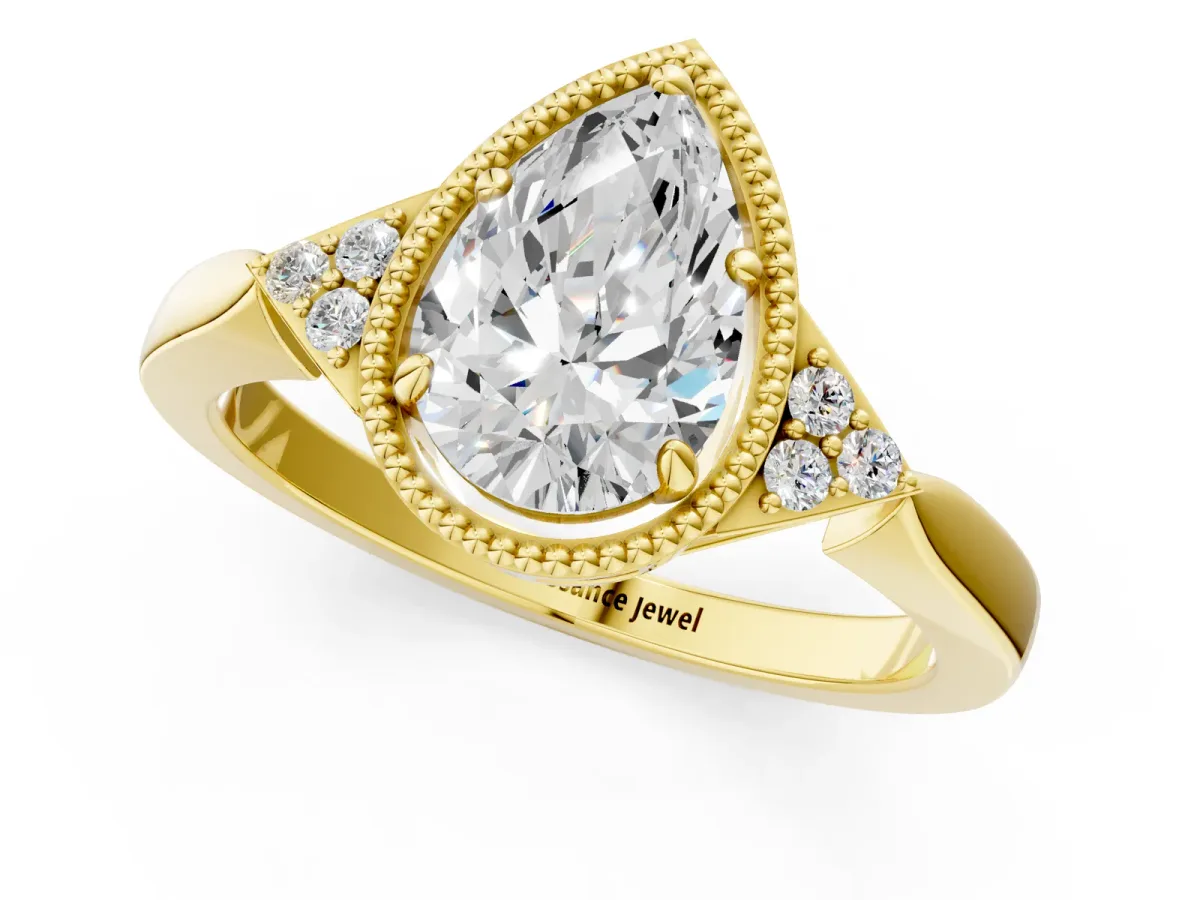 Milgrain Pear Cut Cut Diamond Ring with Tapered Pave Band and Four Prong Setting Yellow gold