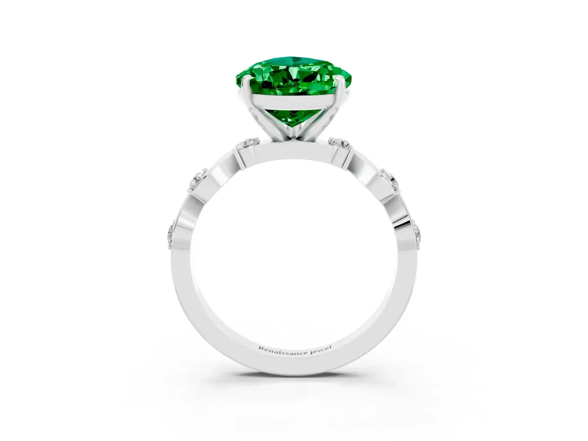 Pear Cut Emerald Solitaire Twisted Band with Round Accents and Prong Setting Silver