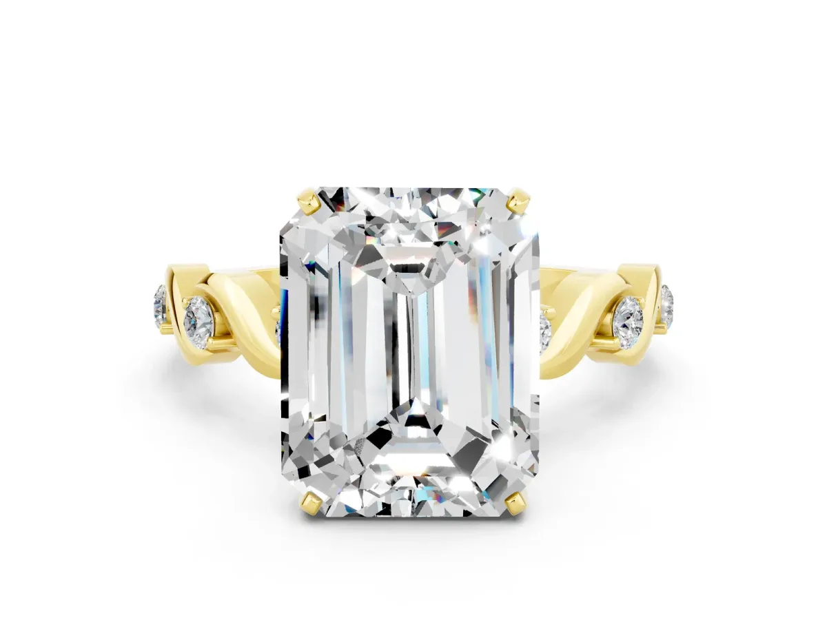 Emerald Cut Moissanite Solitaire Twisted Band with Round Accents and Prong Setting Yellow gold