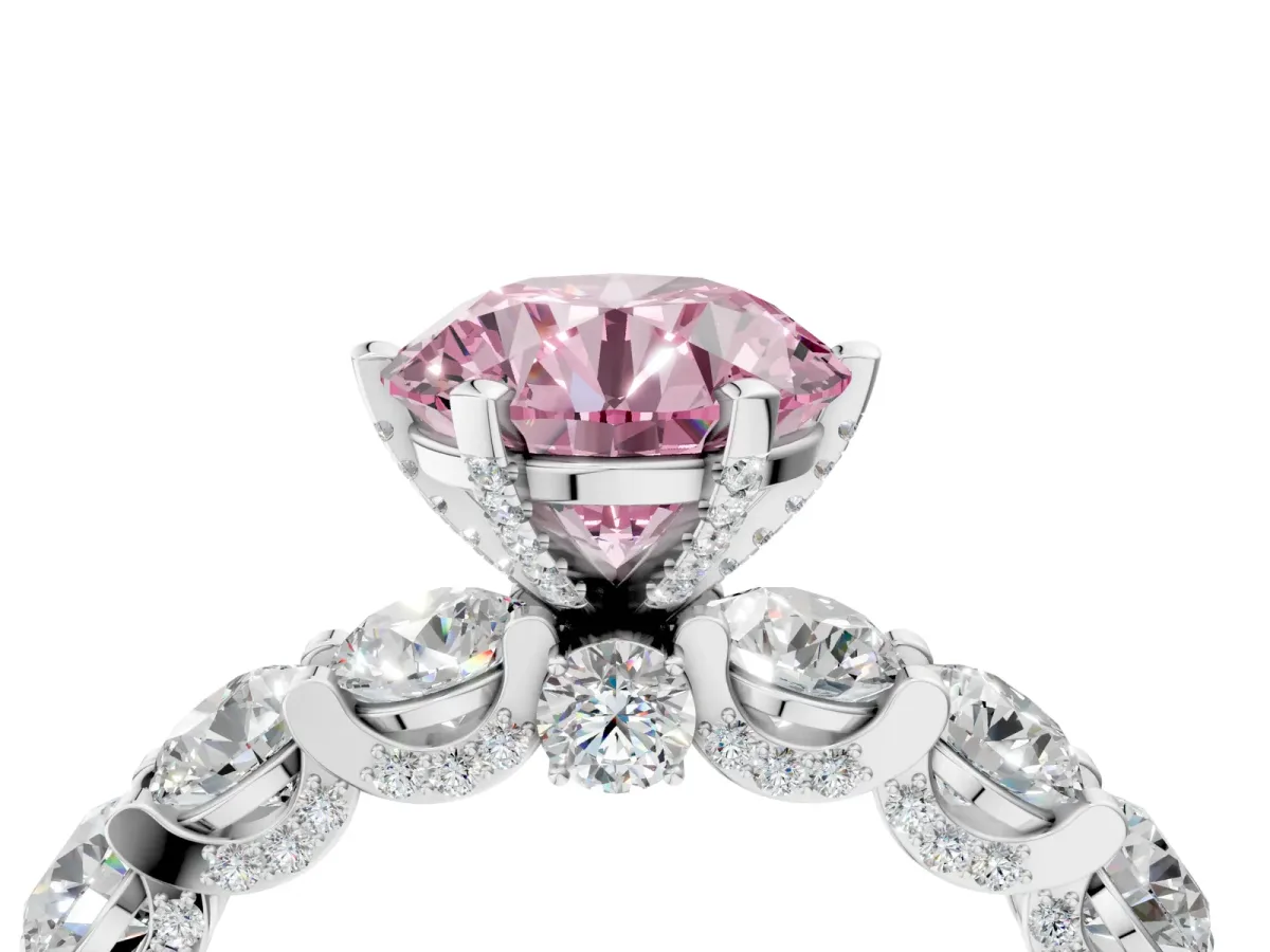 Fancy Pink Round Cut Diamond Side Stone Engagement Ring with Four-Prong Setting Silver
