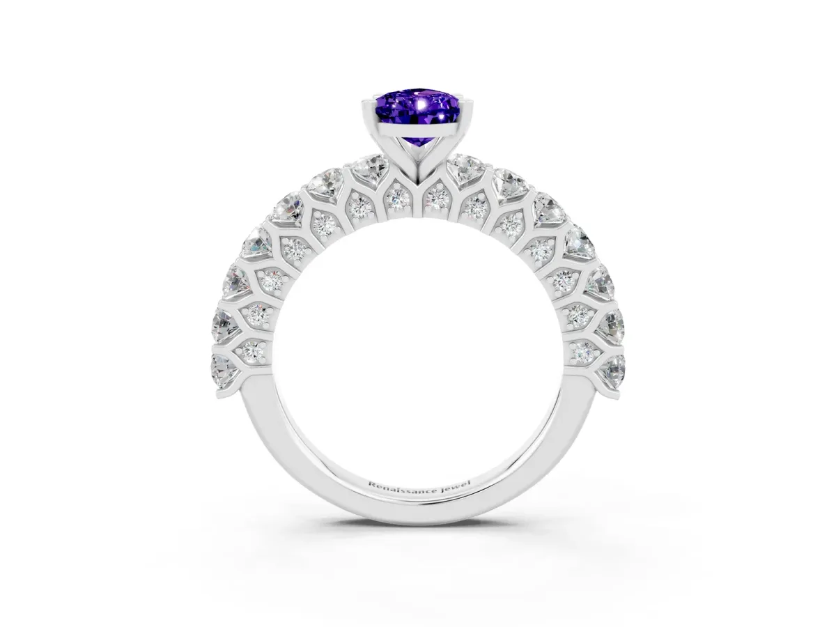 Pear Cut Tanzanite Solitaire Ring with Shared Prong Pavé Band and Four-Prong Setting Silver