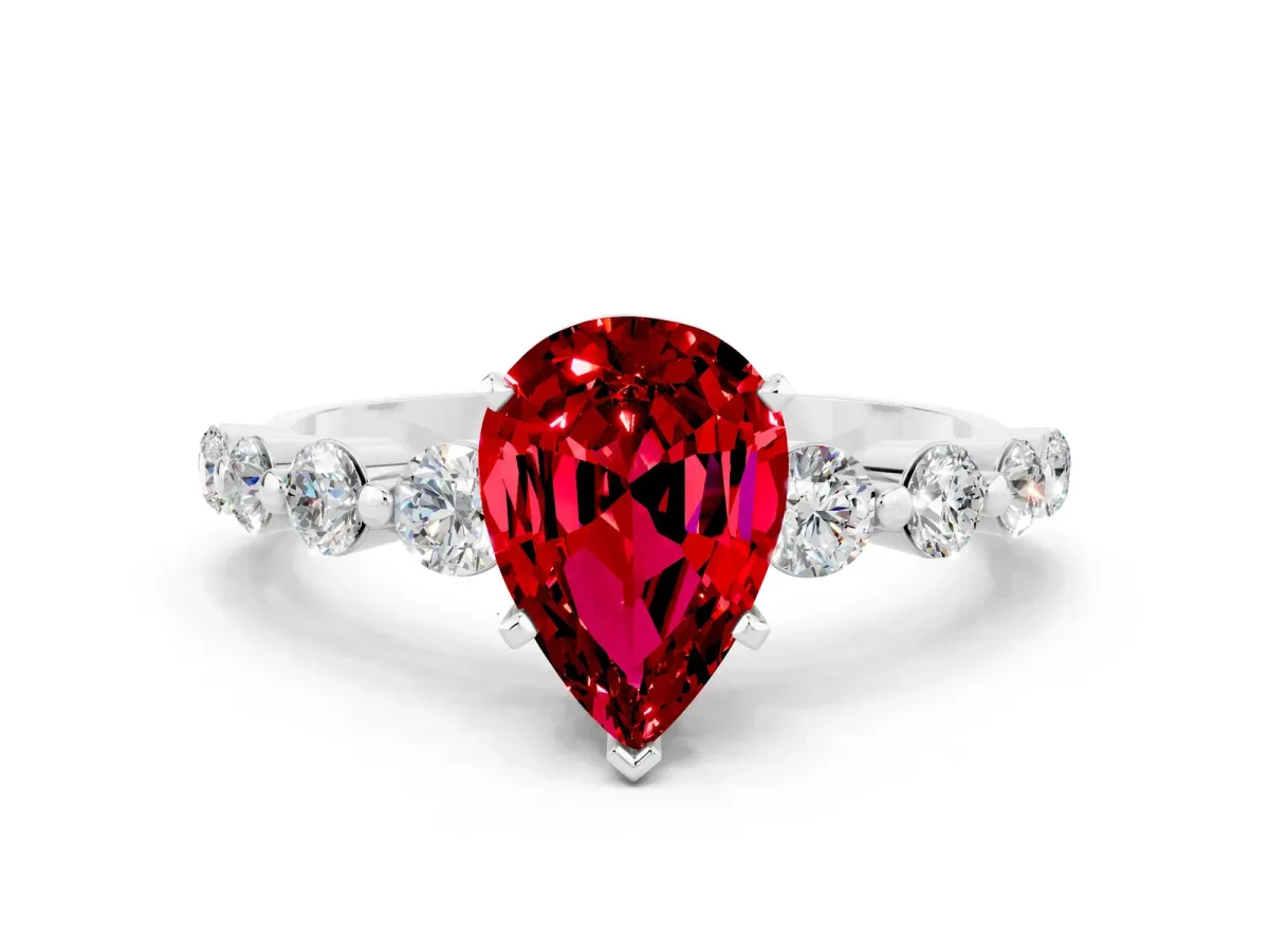 Pear Cut Solitaire Ruby Ring with Pave Band and Four-Prong Setting White gold
