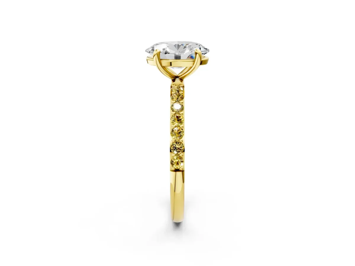 Oval Cut Diamond Solitaire Ring with Round Yellow Sapphire Pavé Band and Prong Setting Yellow gold