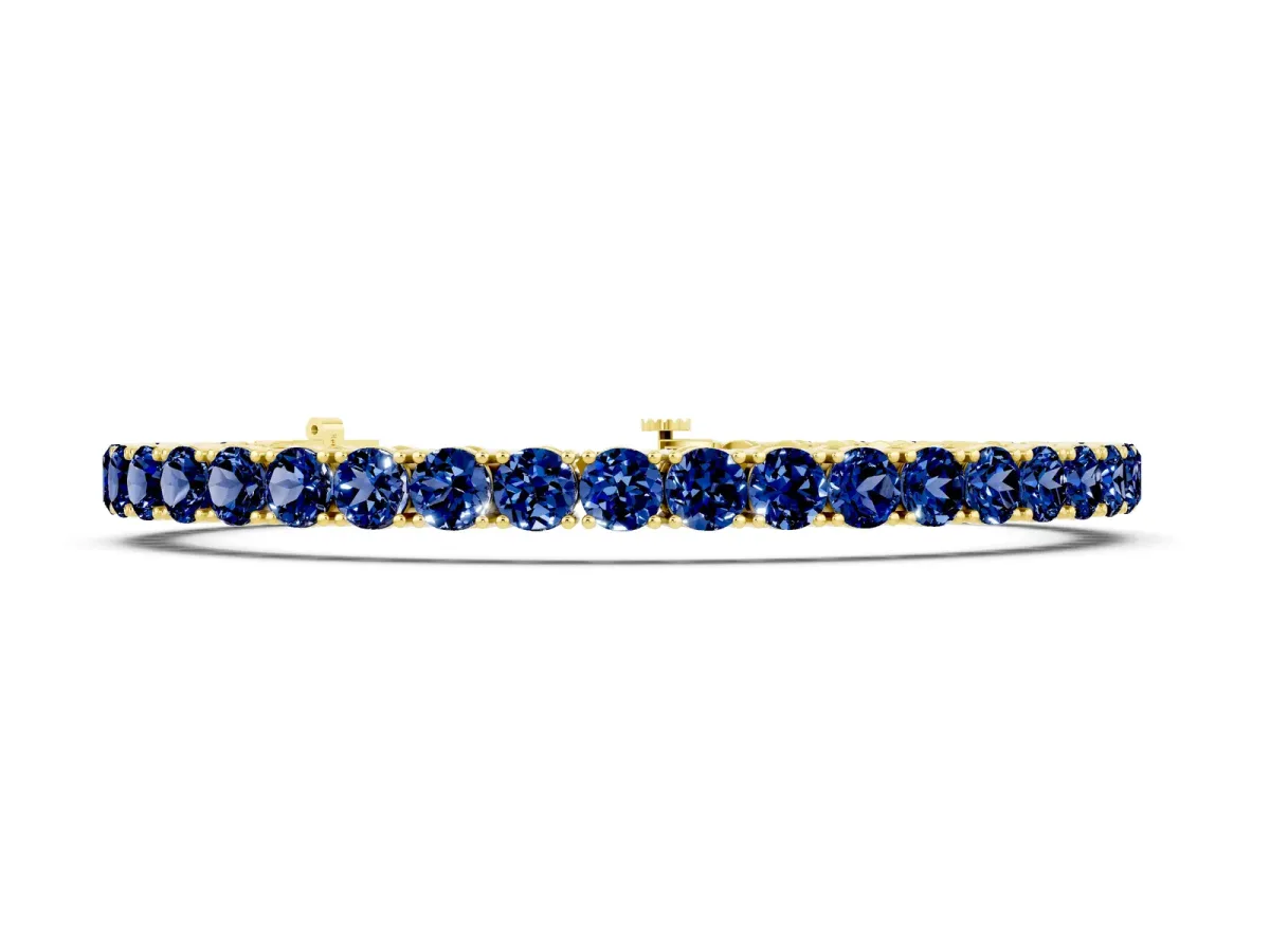 Round Brilliant Blue Sapphire Tennis Bracelet with Prong Setting Yellow gold