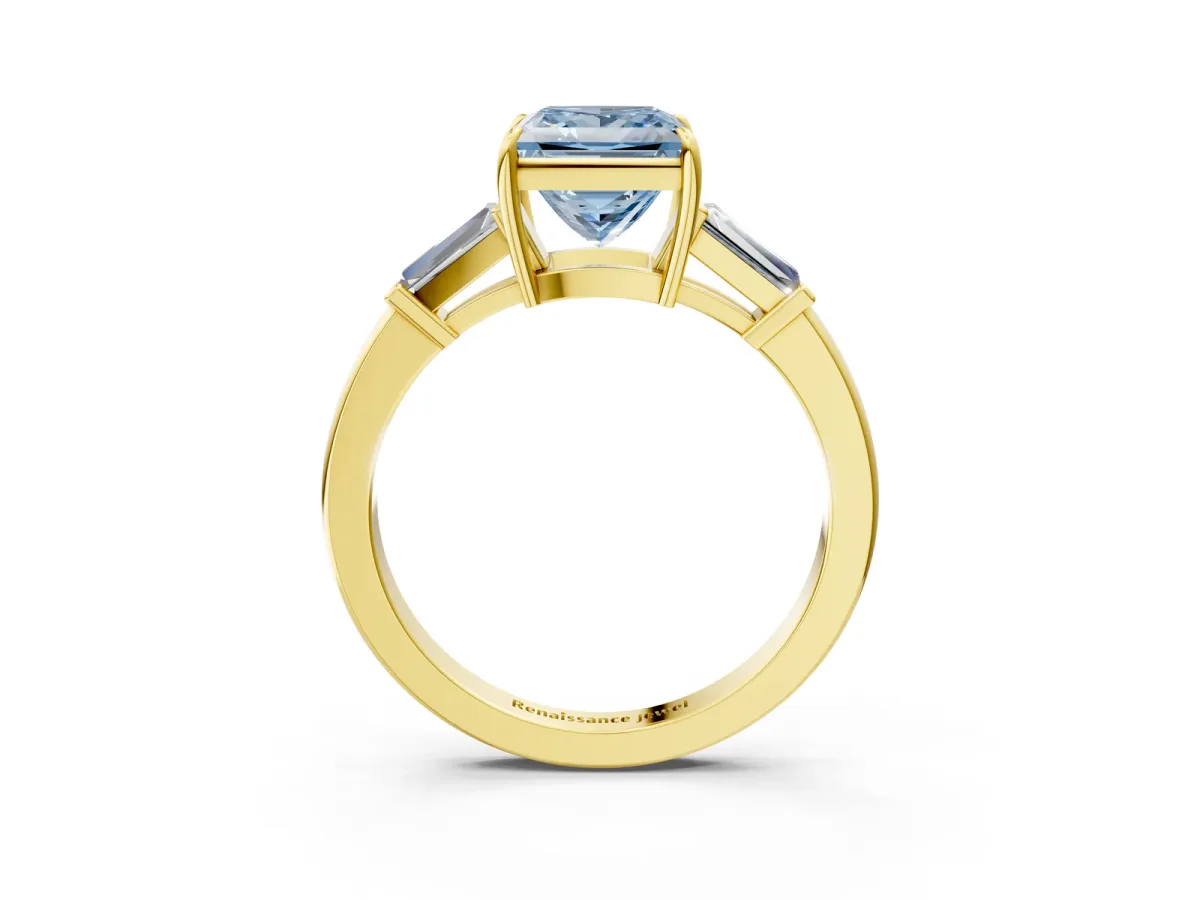 Fancy Blue Princess Cut Diamond Three-Stone Ring with Tapered Baguette Side Stones and Prong Setting Yellow gold