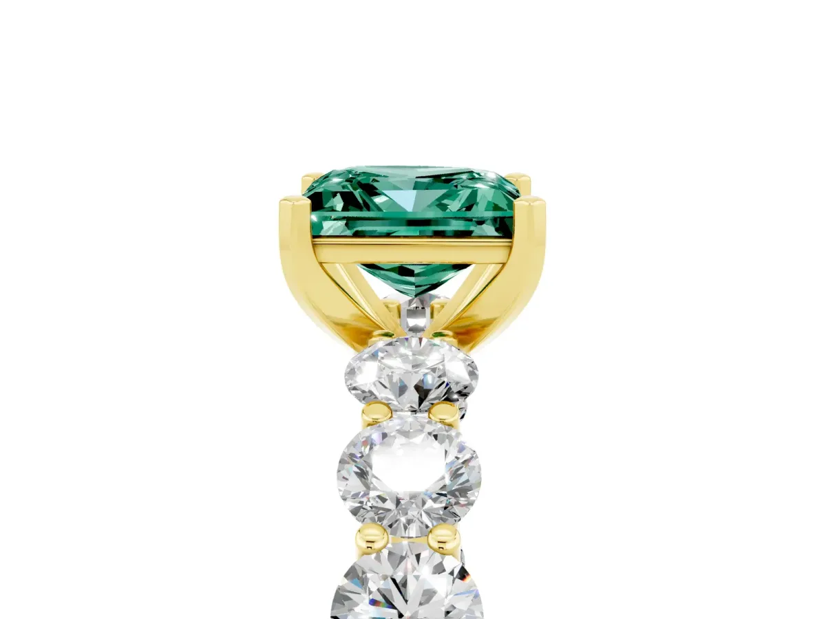 Princess Cut Green Sapphire Prong Setting with Side Stones on a Pave Band Yellow gold
