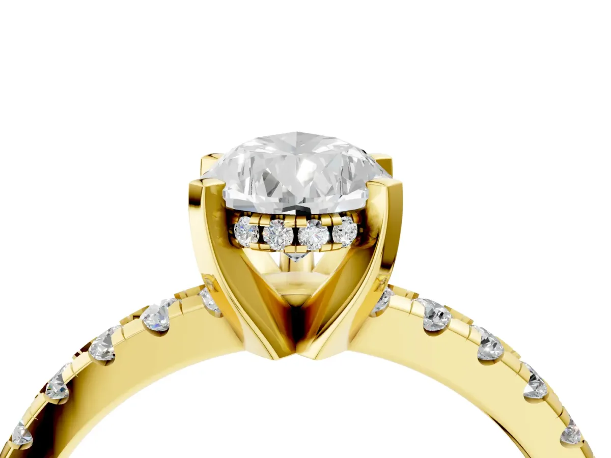 Pear Cut Diamond Solitaire Ring with Round Pavé Band and Four-Prong Setting Yellow gold