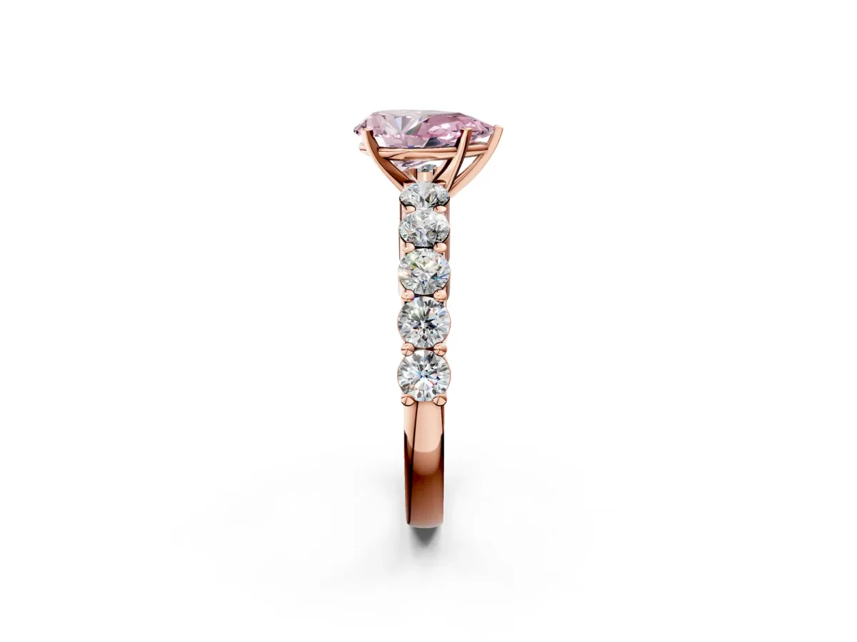 Fancy Pink Pear Cut Diamond Solitaire Ring with Shared Prong Round Side Stones Rose gold