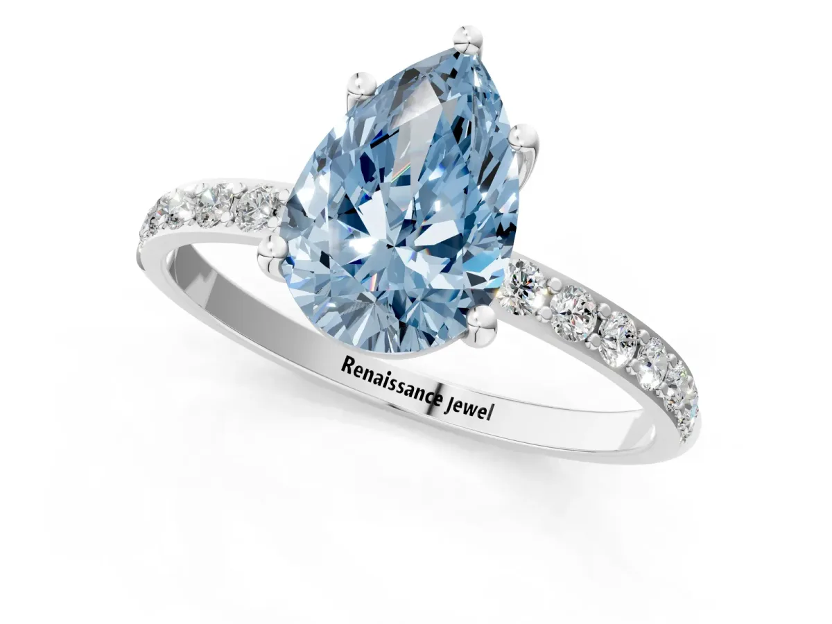 Fancy Blue Pear Cut Diamond Solitaire Ring with Round Pavé Shoulders and Prong Setting White gold