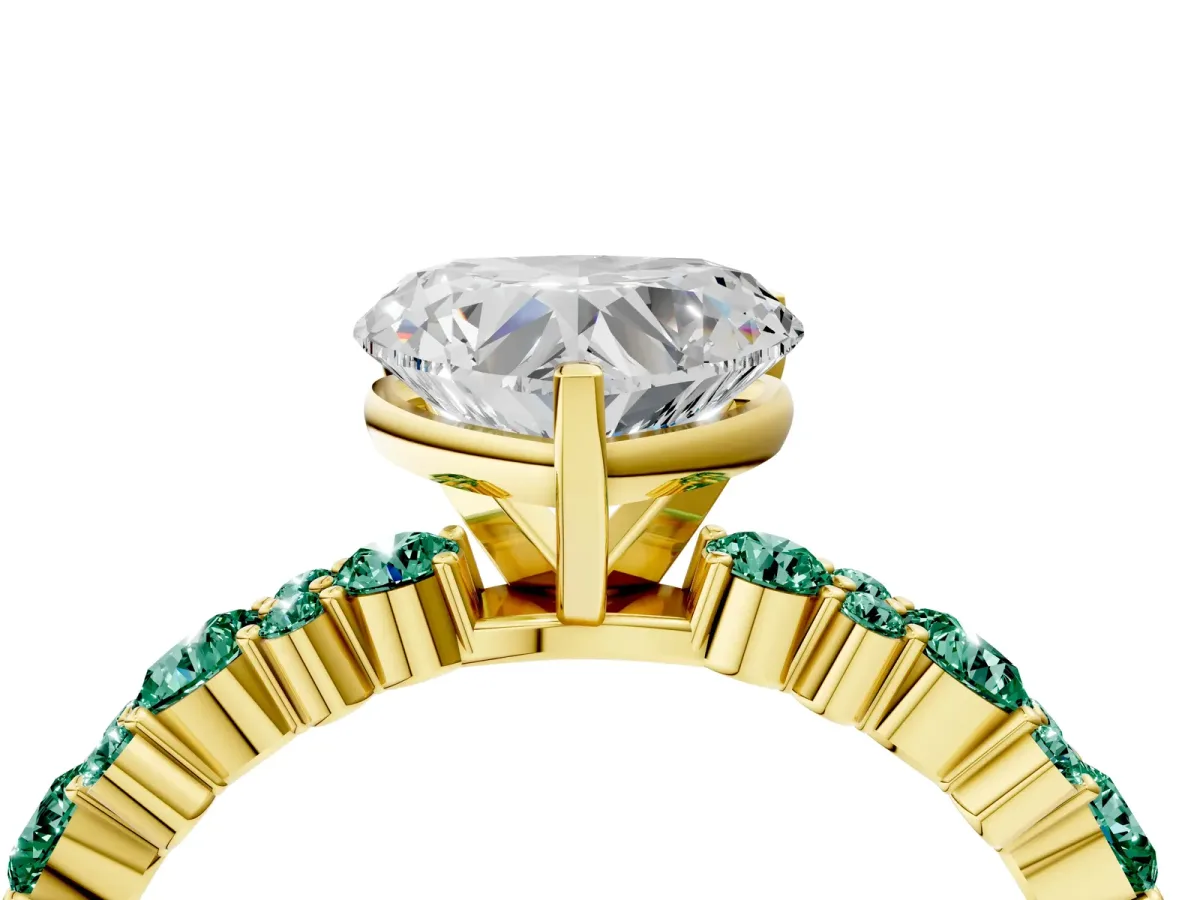 Heart Cut Diamond Side Stone Solitaire Ring with Round Green Sapphire and Four-Prong Setting Yellow gold