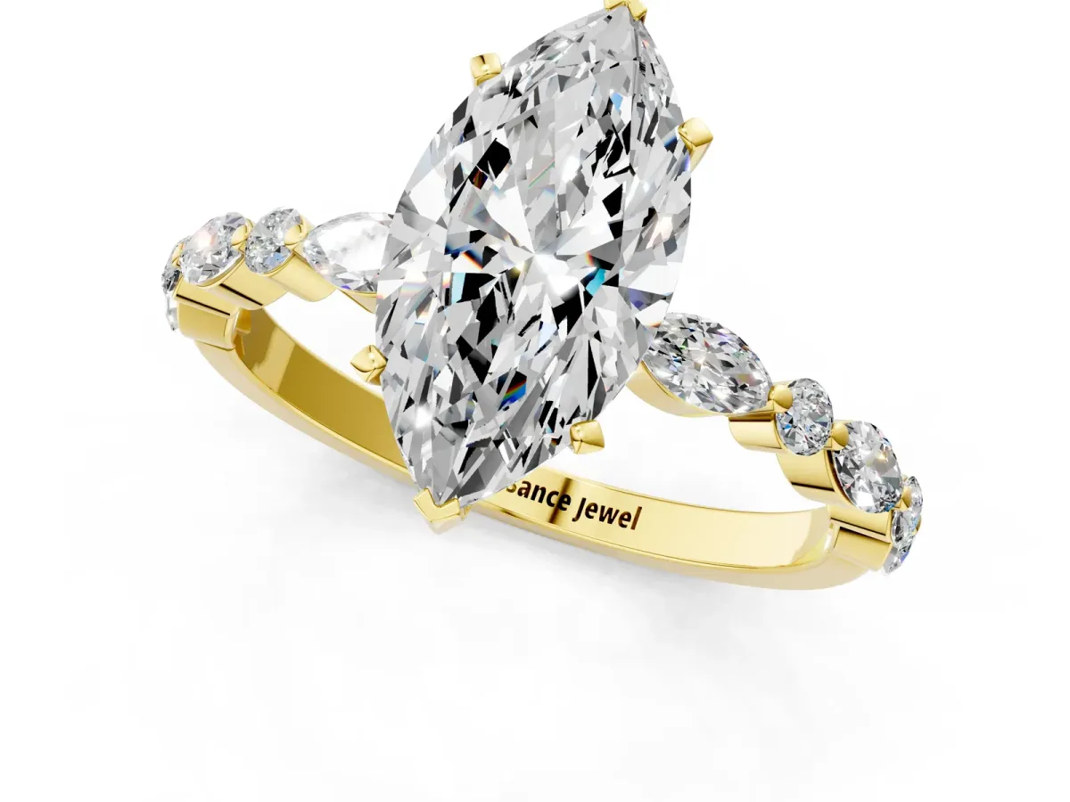 Marquise Cut Diamond Ring with Marquise and Round Side Stones and Four-Prong Setting Yellow gold