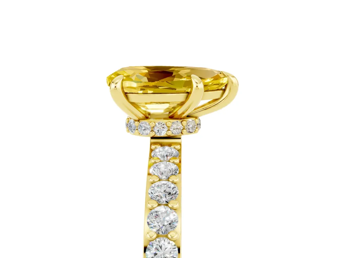 Pear Cut Yellow Sapphire Solitaire Engagement Ring with Pavé Band and Four-Prong Setting Yellow gold