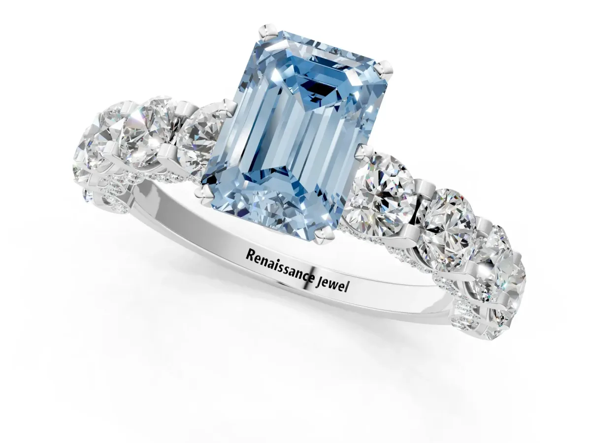 Fancy Blue Emerald Cut Diamond Side Stone Engagement Ring with Four-Prong Setting White gold
