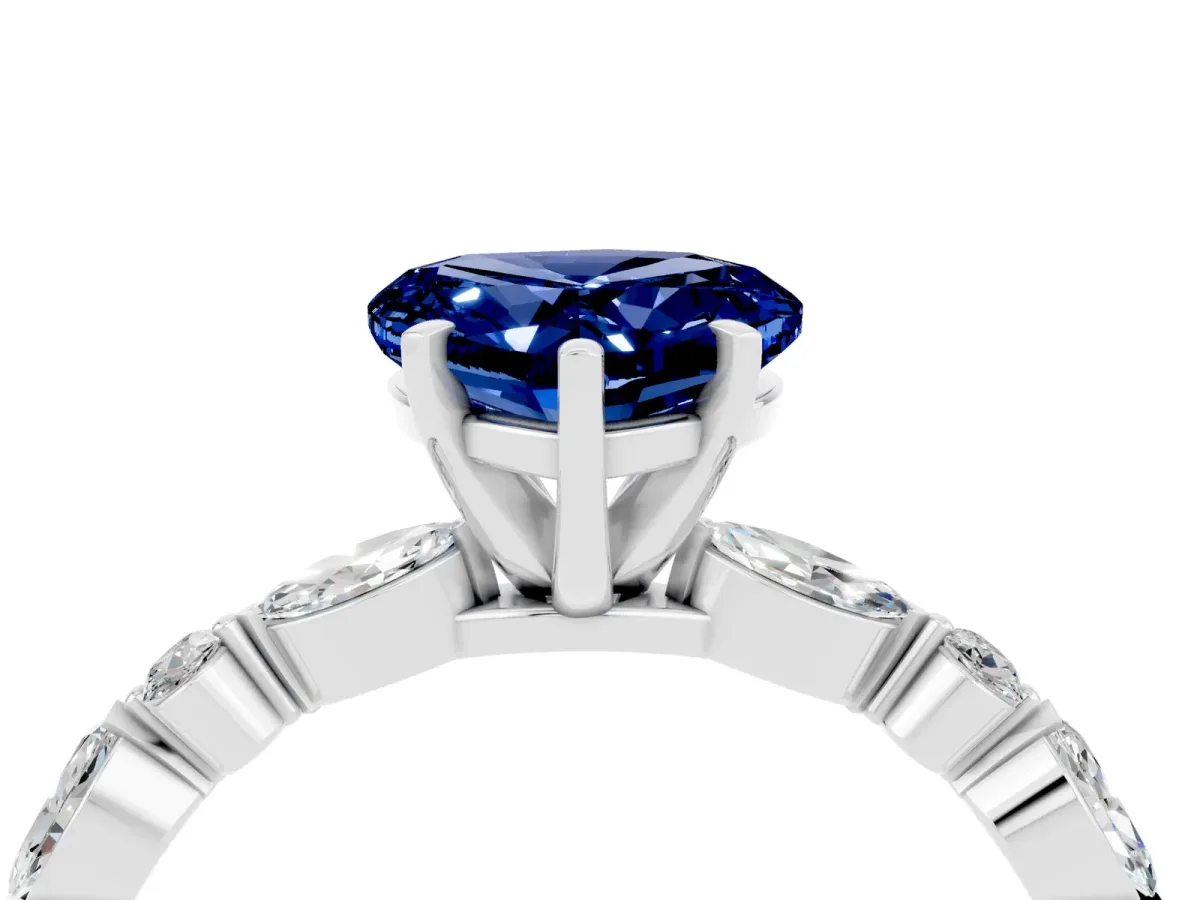 Heart Cut Blue Sapphire Ring with Marquise and Round Side Stones and Four-Prong Setting White gold