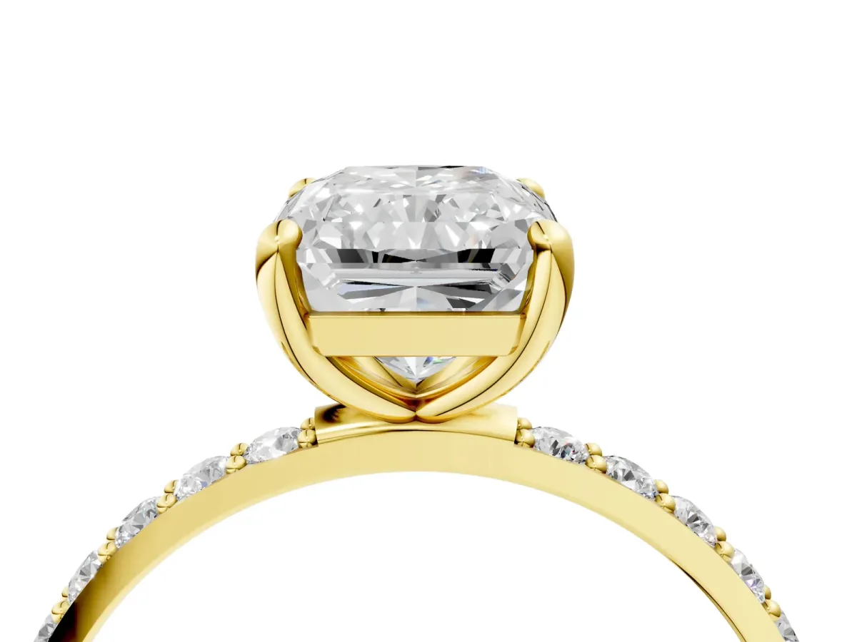 Radiant Cut Diamond Solitaire Ring with Round Moissanite Pavé Band and Prong Setting Yellow gold