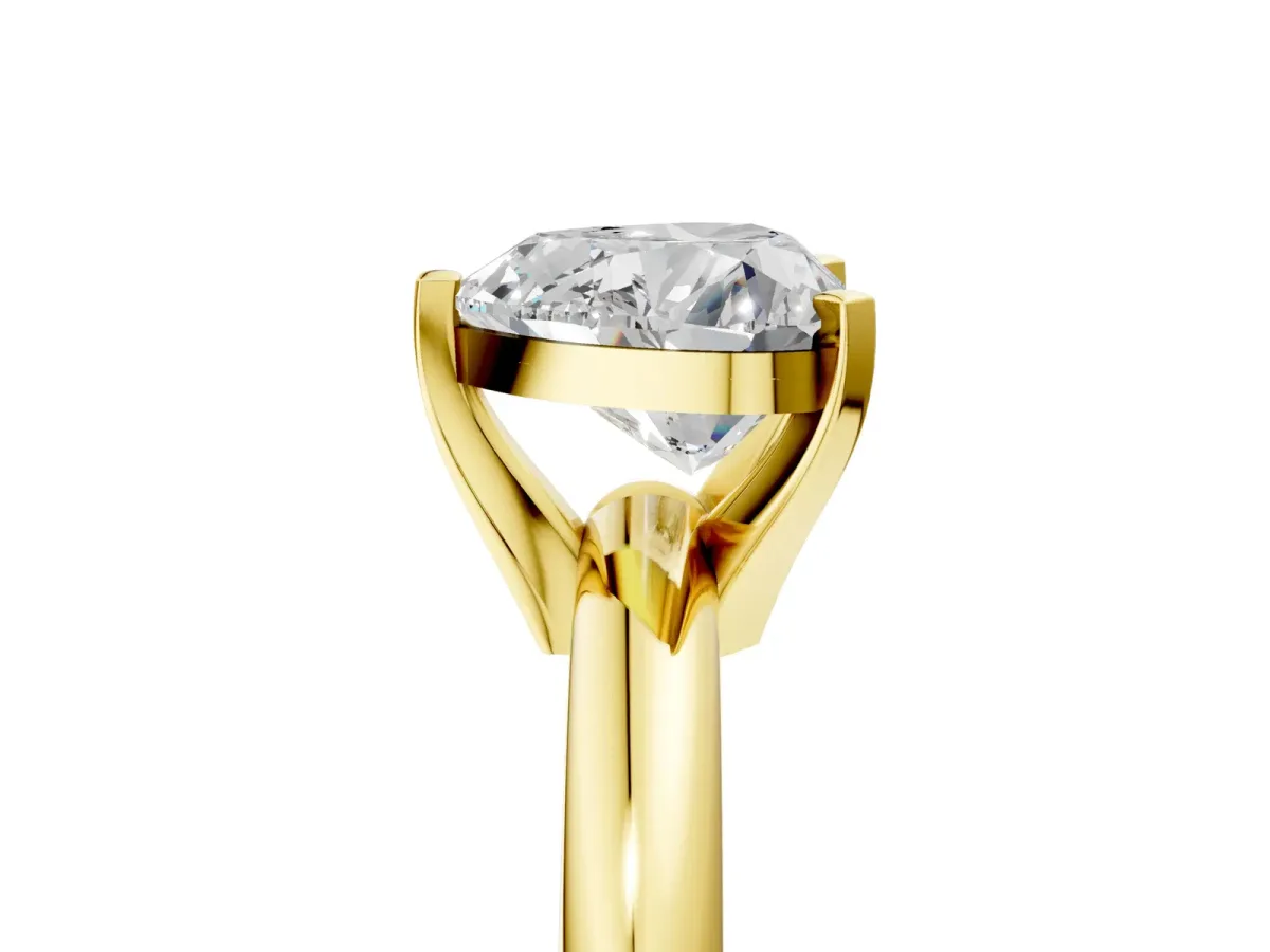 Heart Cut Diamond Solitaire Engagement Ring with Round Band and Four-Prong Setting Yellow gold
