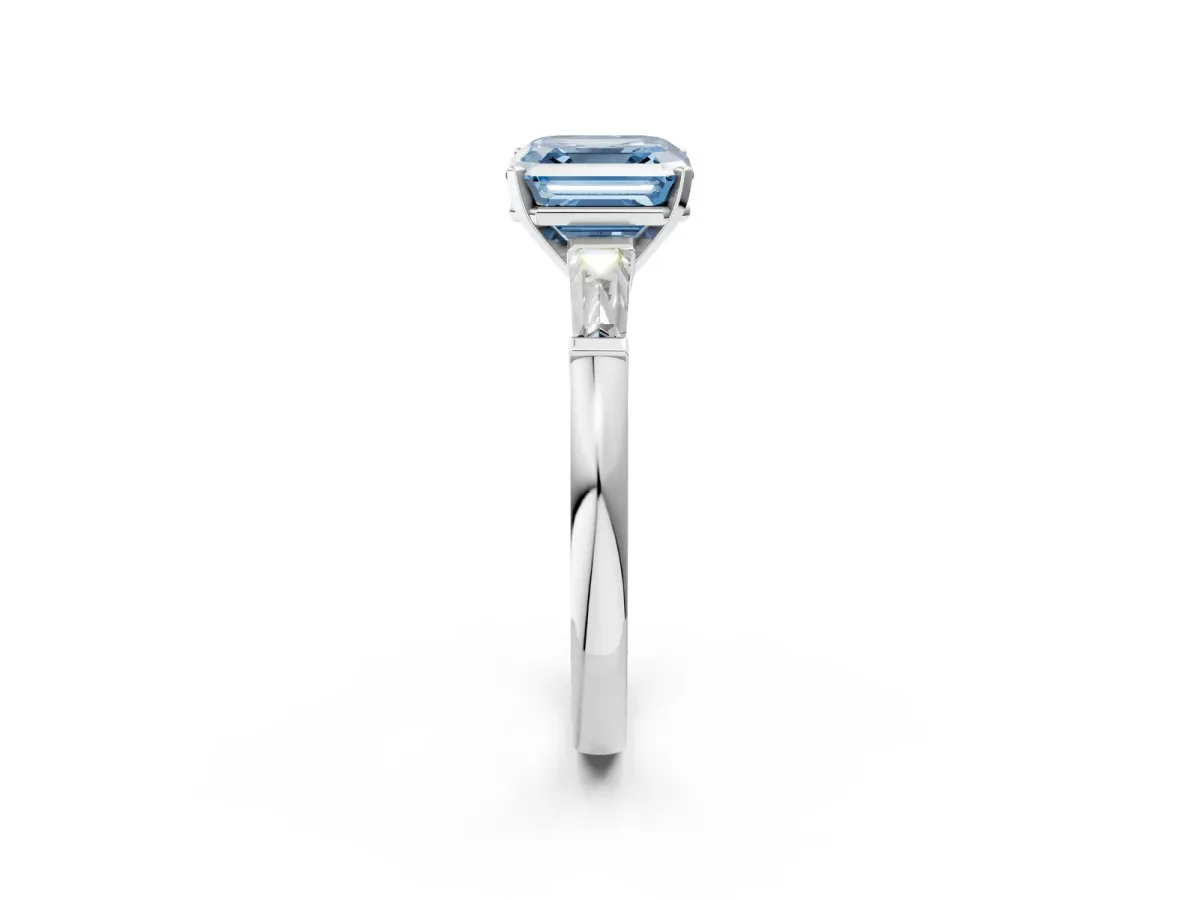 Fancy Blue Asscher Cut Solitaire with Tapered Baguette Side Stones on a Classic Band with Four-Prong Setting Platinum