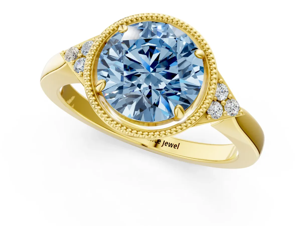 Fancy Blue Milgrain Round Cut Cut Diamond Ring with Tapered Pave Band and Four Prong Setting Yellow gold