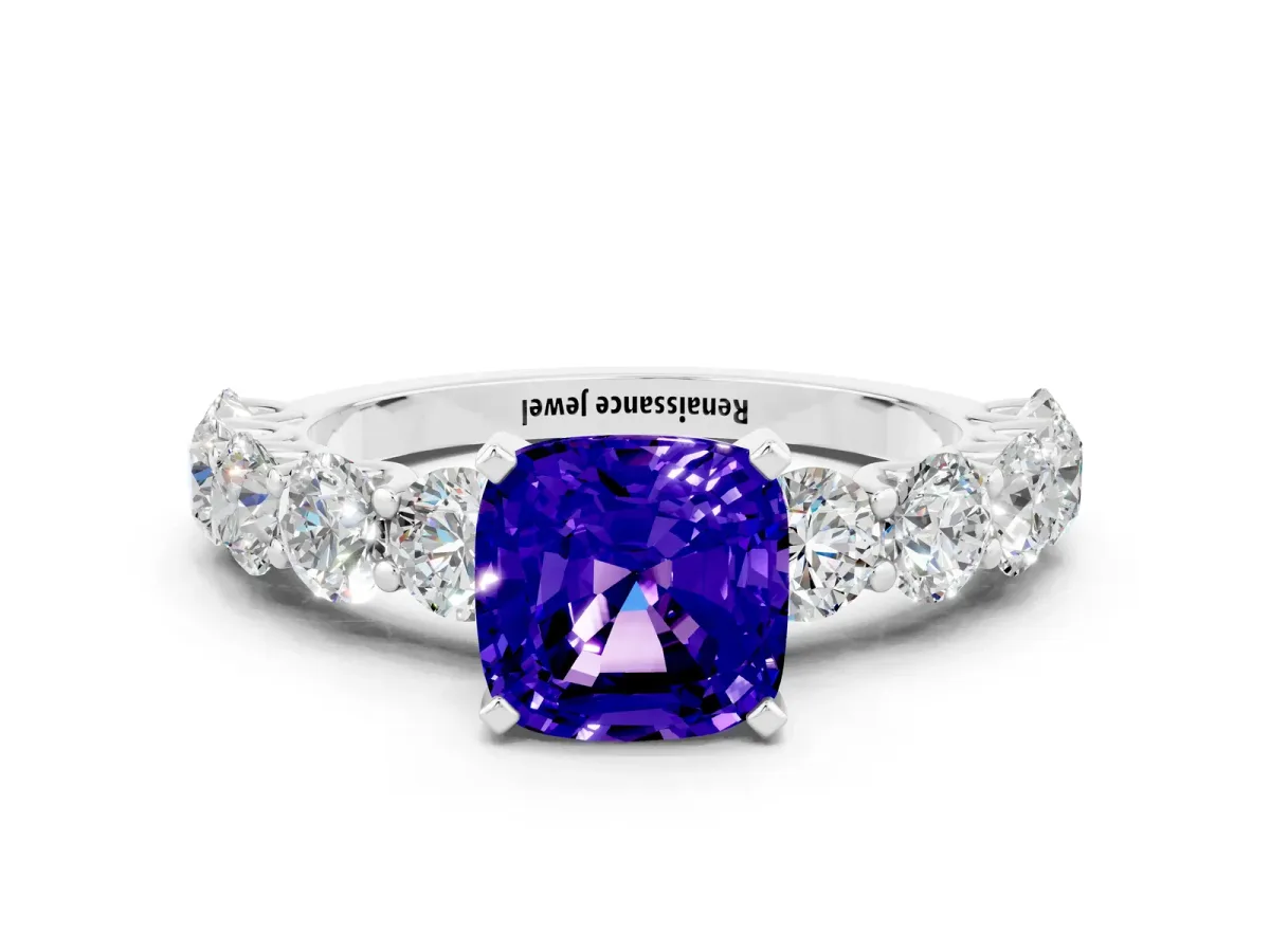 Cushion Cut Tanzanite Prong Setting with Side Stones on a Pave Band Silver