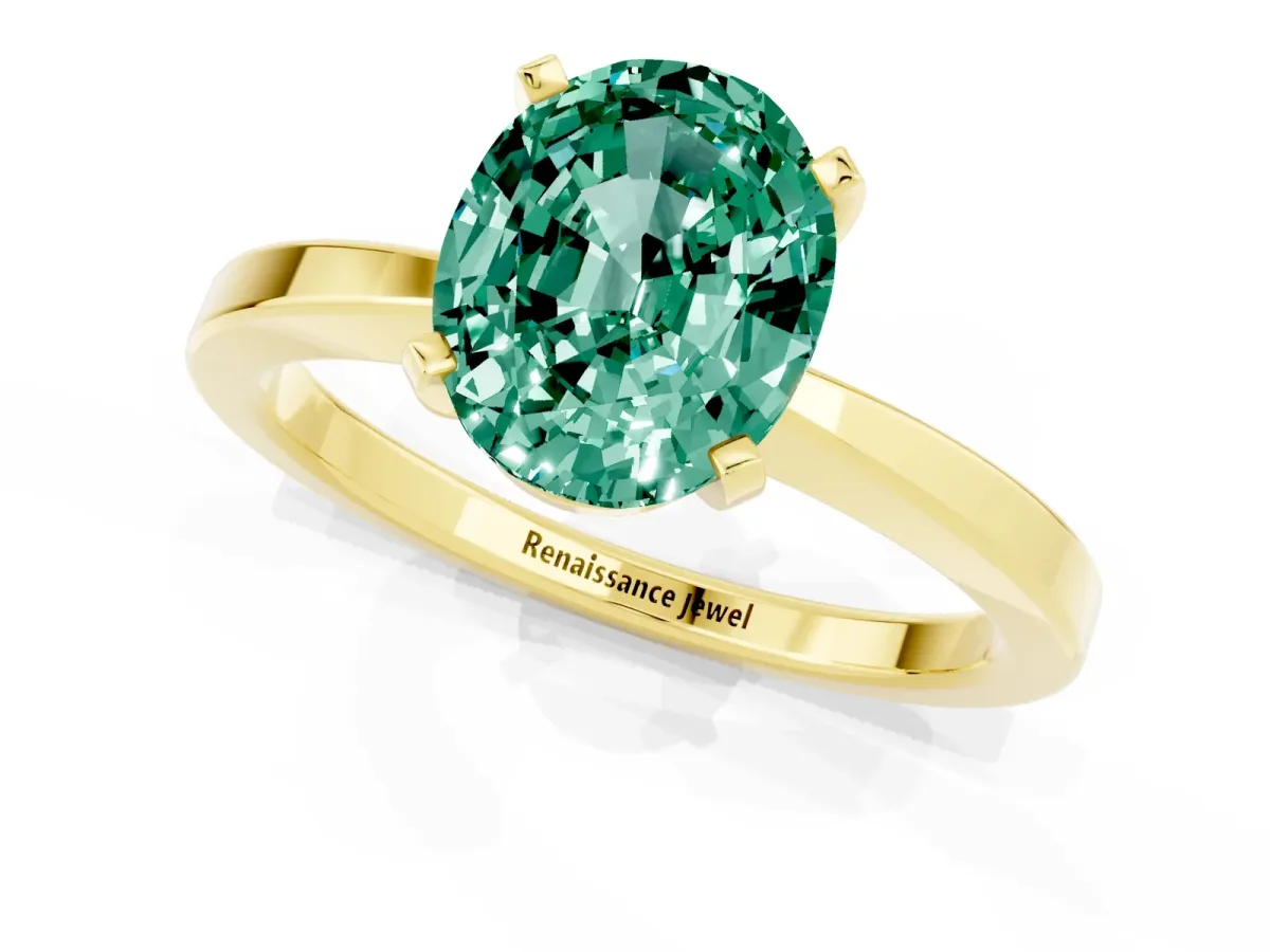 Oval Cut Green Sapphire Solitaire Engagement Ring with Classic Band and Four-Prong Setting Yellow gold