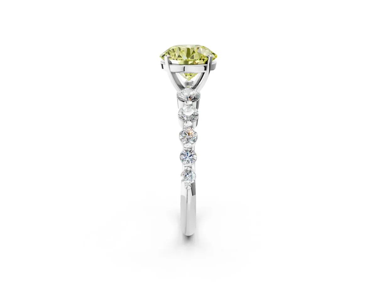 Fancy Yellow Round Cut Solitaire Diamond Ring with Pave Band and Four-Prong Setting Silver