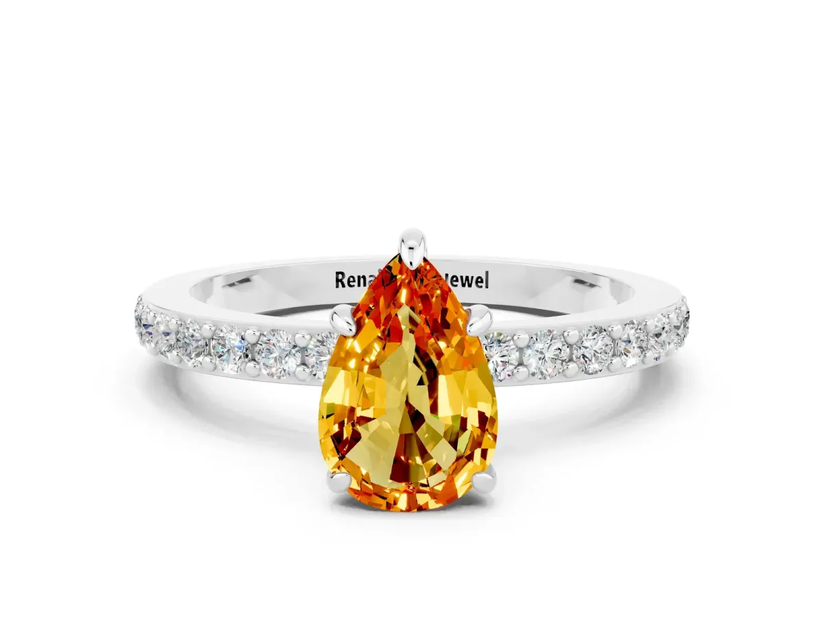 Pear Cut Citrine Solitaire Engagement Ring with Pavé Band and Four-Prong Setting Silver