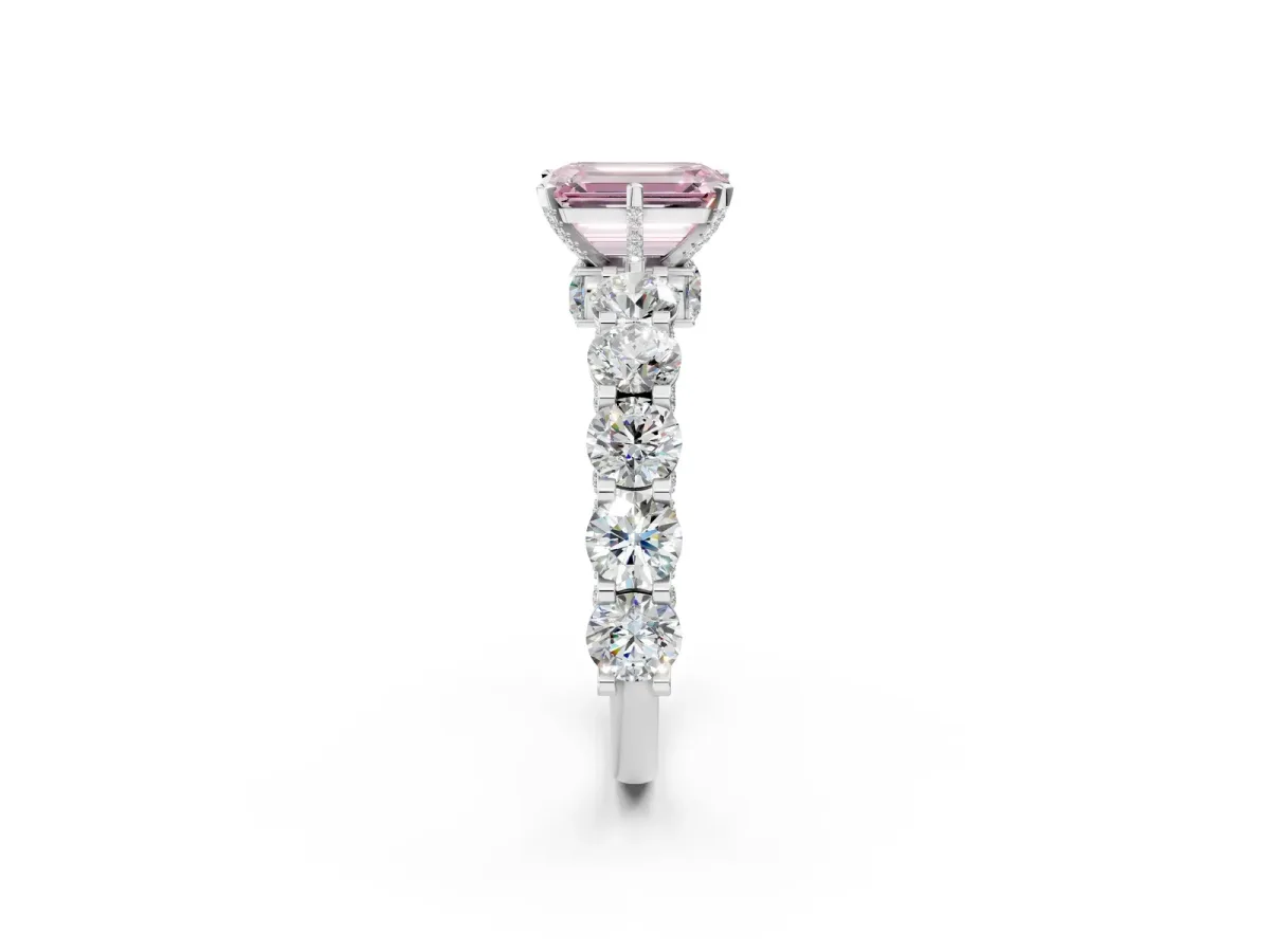 Fancy Pink Emerald Cut Diamond Side Stone Engagement Ring with Four-Prong Setting Platinum