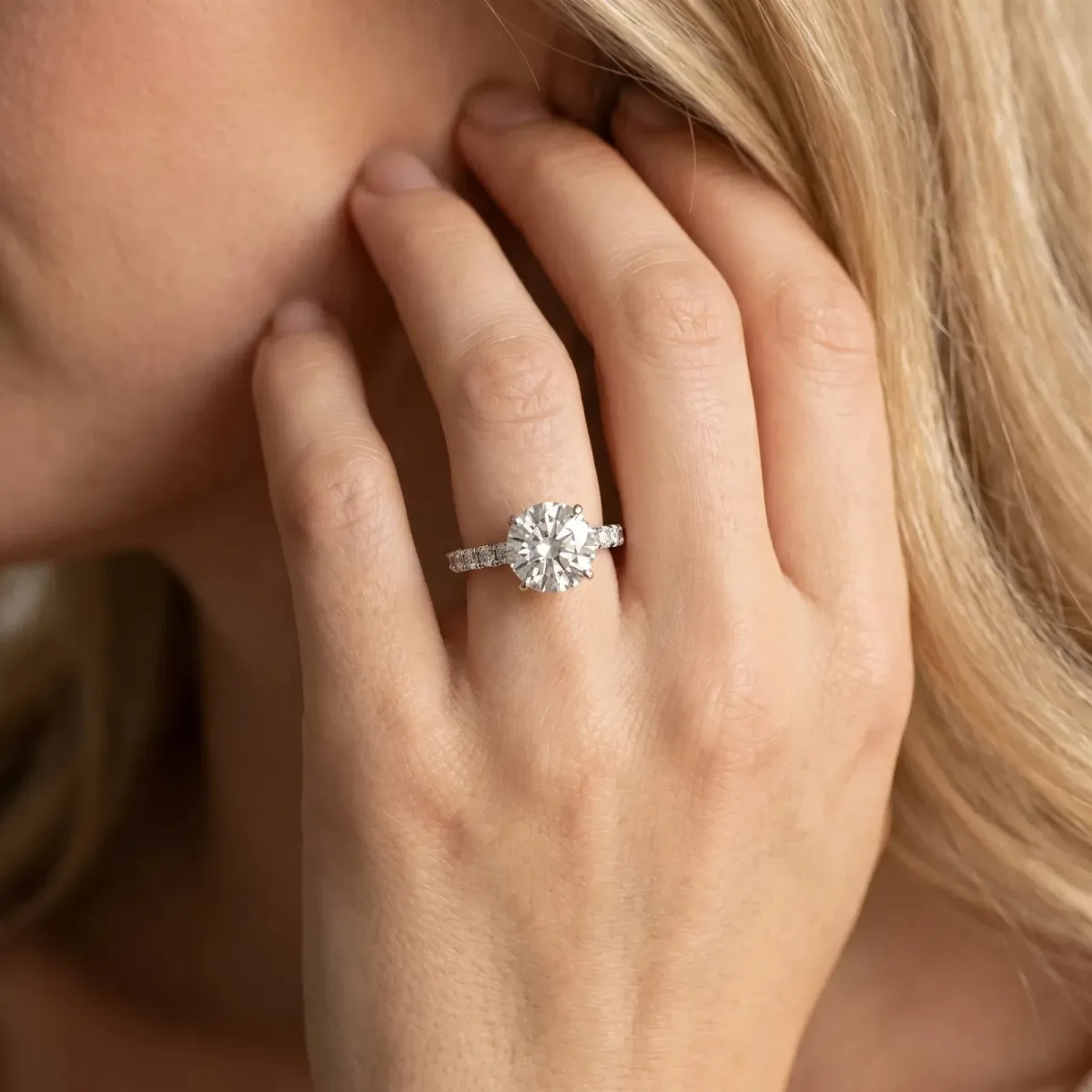 Round Cut Diamond Solitaire Pavé Band with Four-Prong Setting Silver
