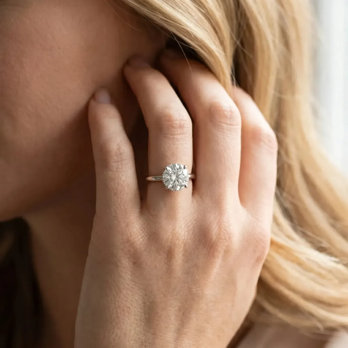 Round Cut Diamond Solitaire Ring with Classic Band and Four-Prong Setting Platinum
