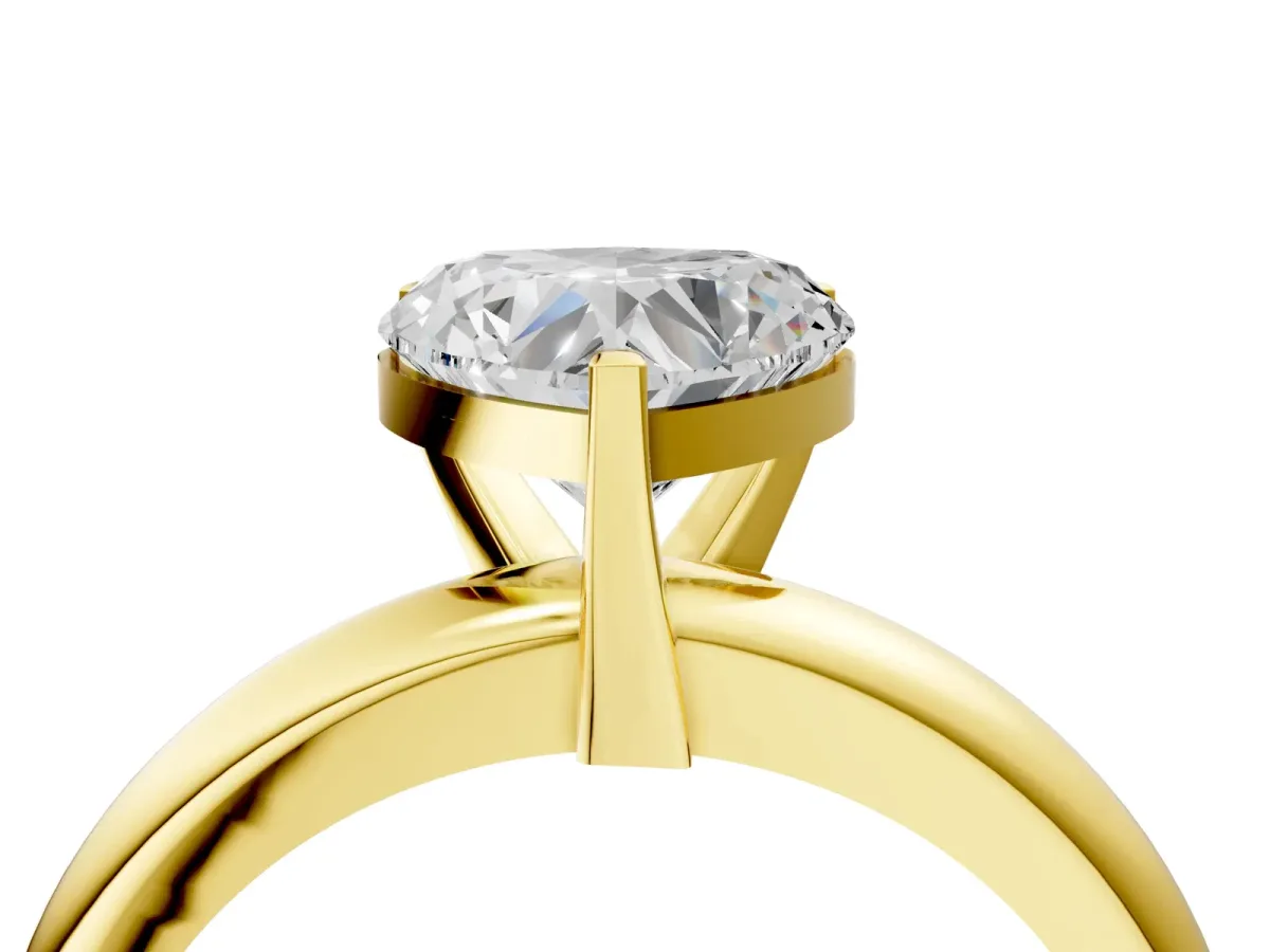 Heart Cut Diamond Solitaire Engagement Ring with Round Band and Four-Prong Setting Yellow gold
