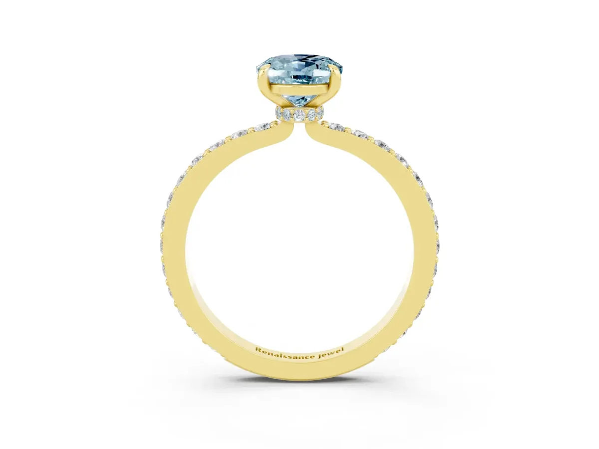 Oval Cut Aquamarine Solitaire Engagement Ring with Pavé Band and Four-Prong Setting Yellow gold