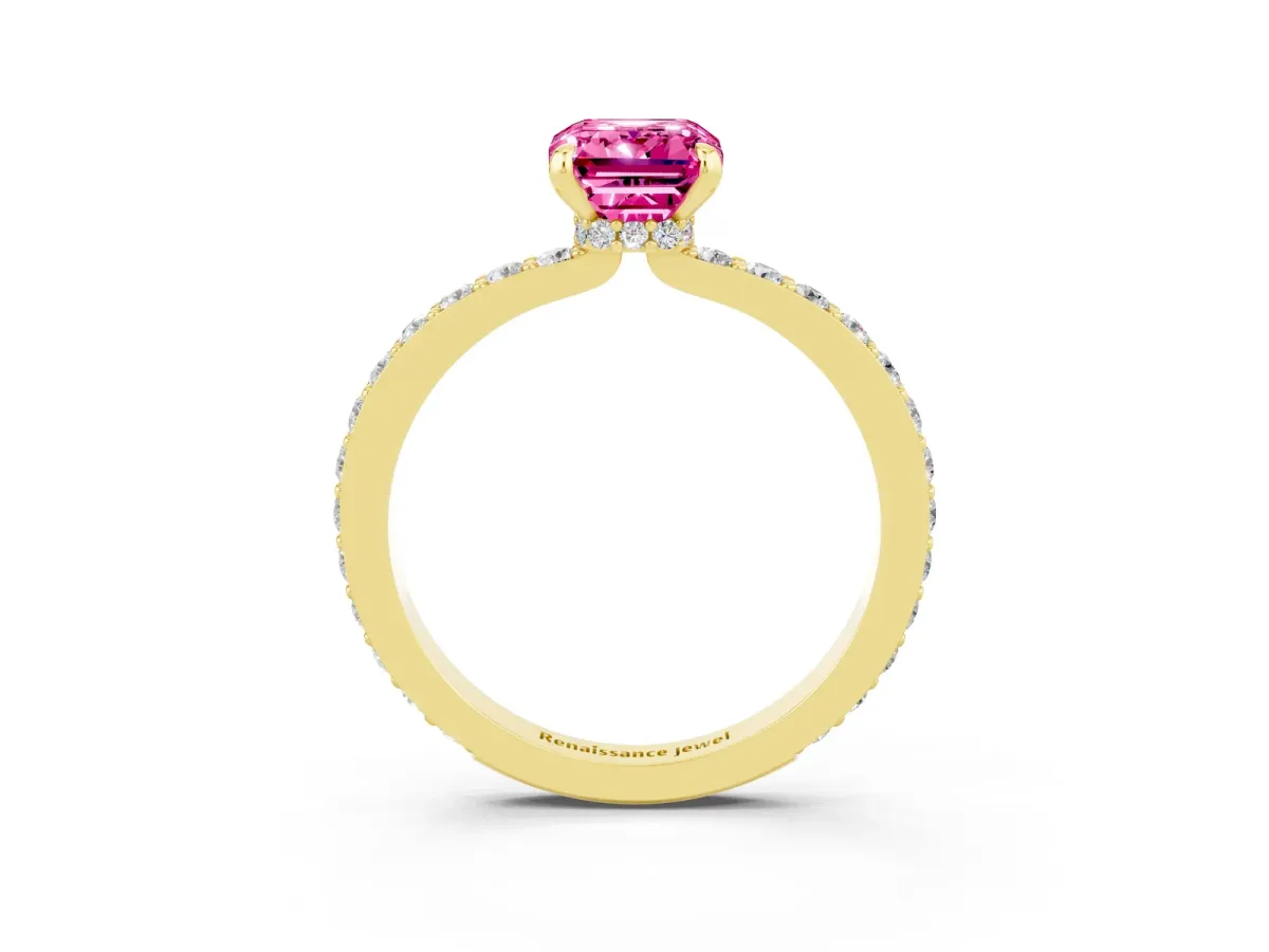 Emerald Cut Pink Sapphire Solitaire Engagement Ring with Pavé Band and Four-Prong Setting Yellow gold