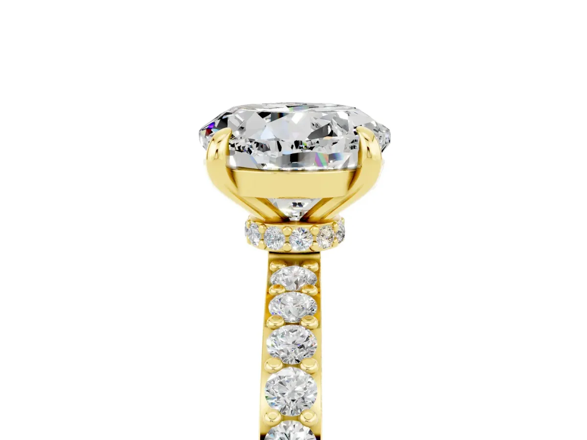 Round Cut Moissanite Solitaire Engagement Ring with Pavé Band and Four-Prong Setting Yellow gold