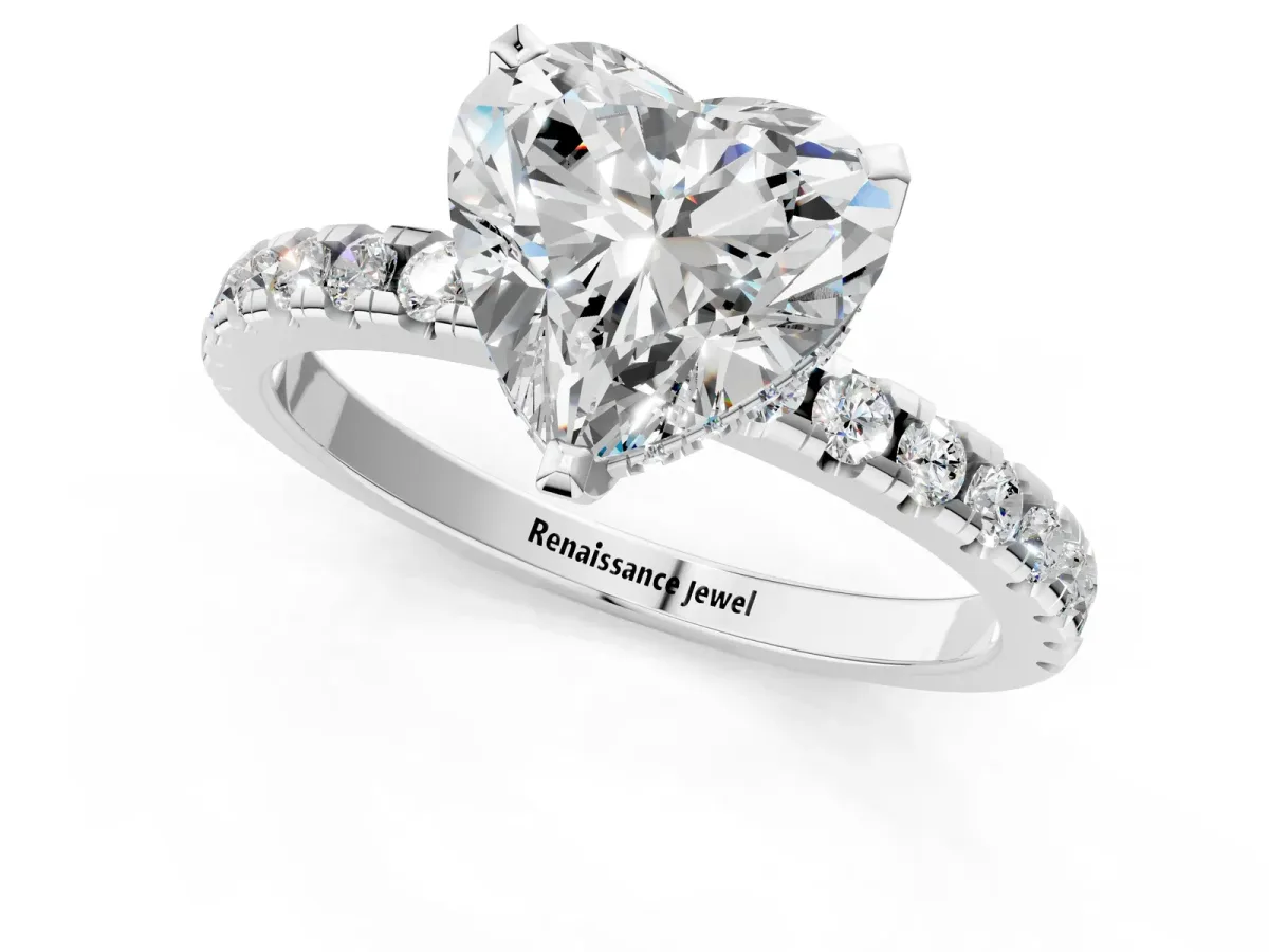 Heart Cut Diamond Solitaire Ring with Round Pavé Band and Four-Prong Setting Platinum