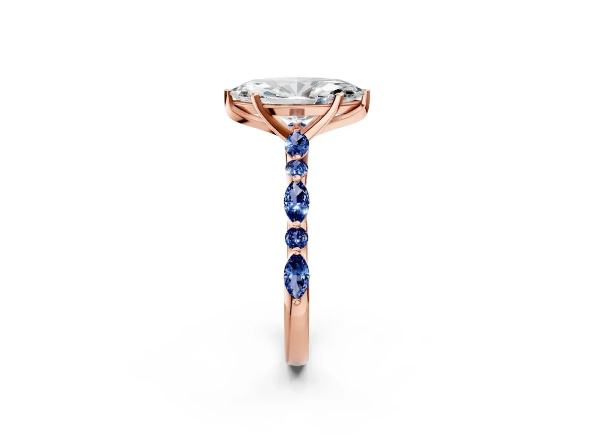 Marquise Cut Diamond Ring with Marquise and Round Blue Sapphire Side Stones and Four-Prong Setting Rose gold