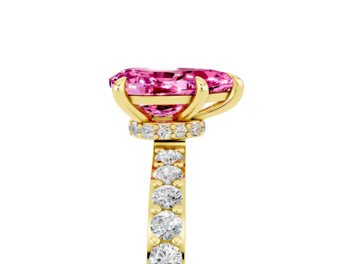 Pear Cut Pink Sapphire Solitaire Engagement Ring with Pavé Band and Four-Prong Setting Yellow gold