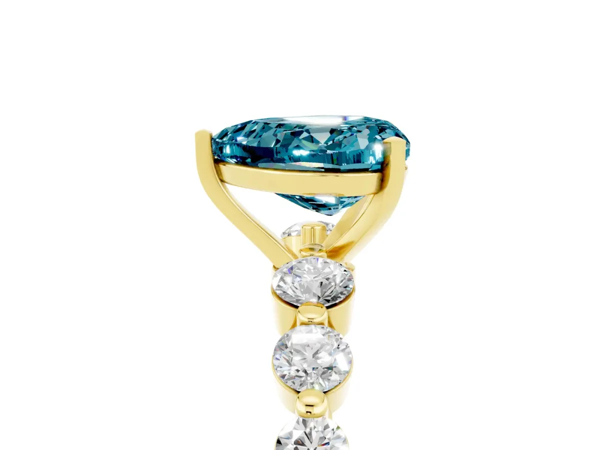 Heart Cut Solitaire Blue Topaz Ring with Pave Band and Four-Prong Setting Yellow gold