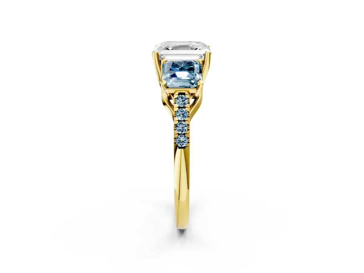 Three-Stone Asscher Cut Diamond Ring with Round Aquamarine Pavé Band and Prong Setting Yellow gold