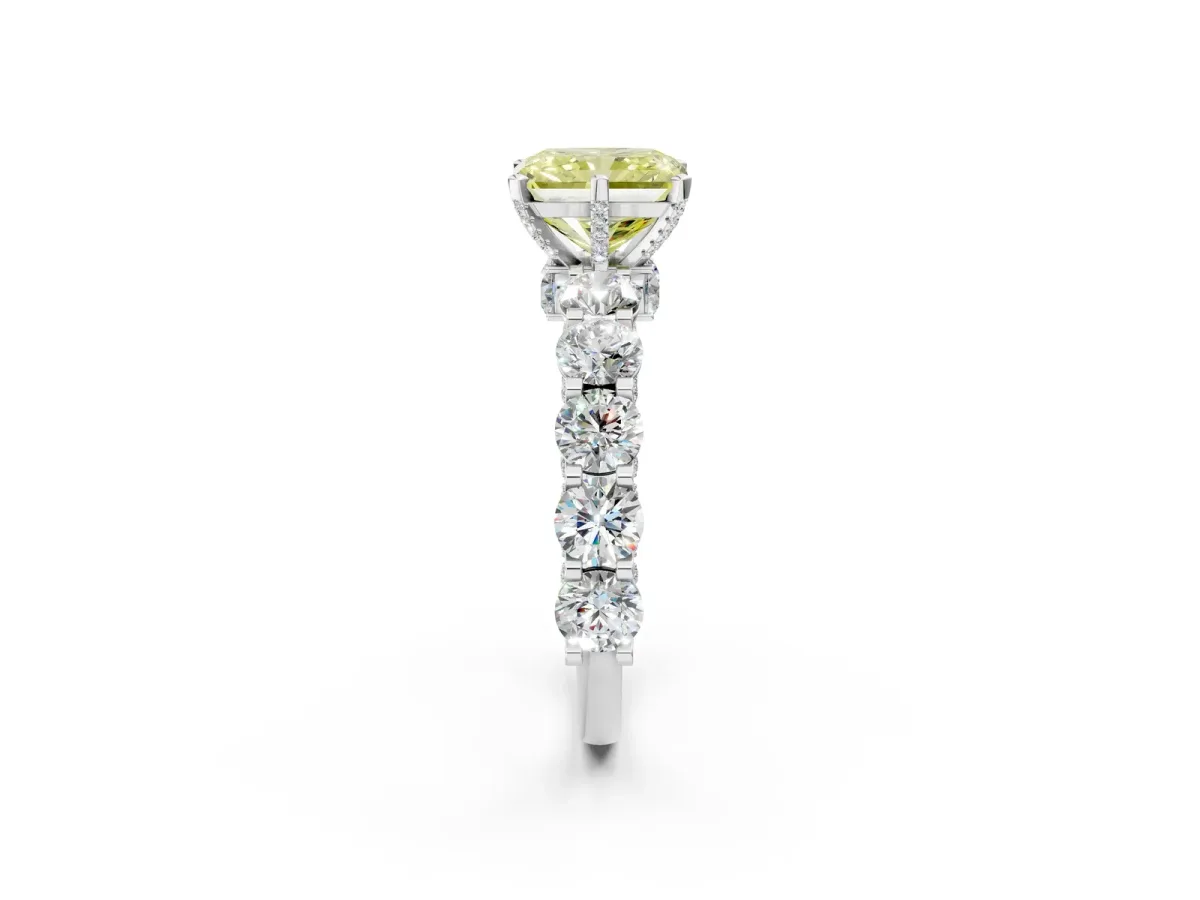 Fancy Yellow Radiant Cut Diamond Side Stone Engagement Ring with Four-Prong Setting Platinum