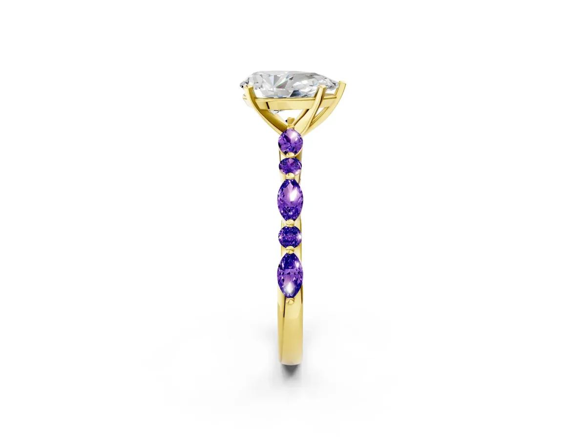 Pear Cut Diamond Ring with Marquise and Round Tanzanite Side Stones and Four-Prong Setting Yellow gold