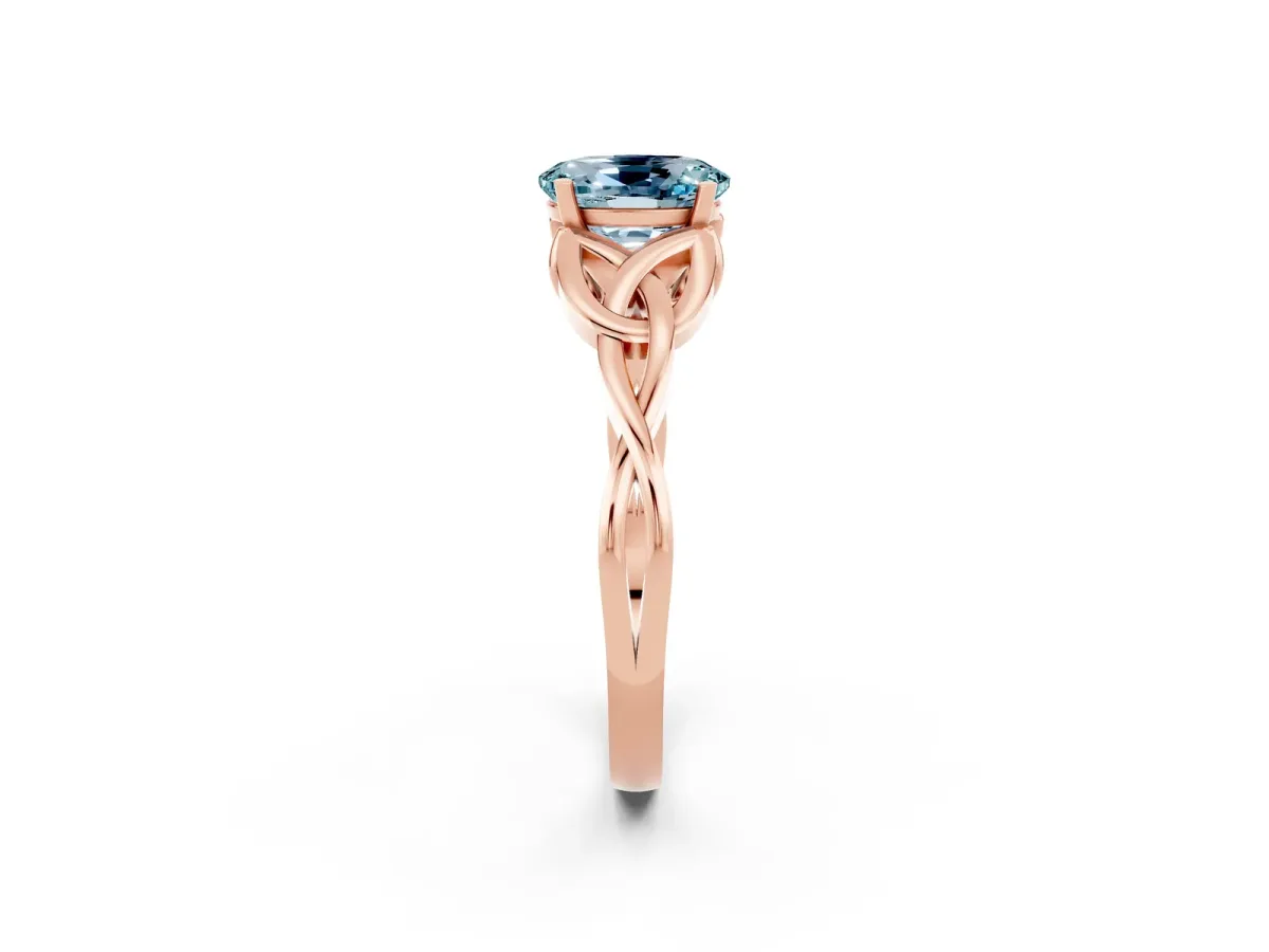 Oval Cut Aquamarine Solitaire Engagement Ring with Celtic Knot Band and Four-Prong Setting Rose gold