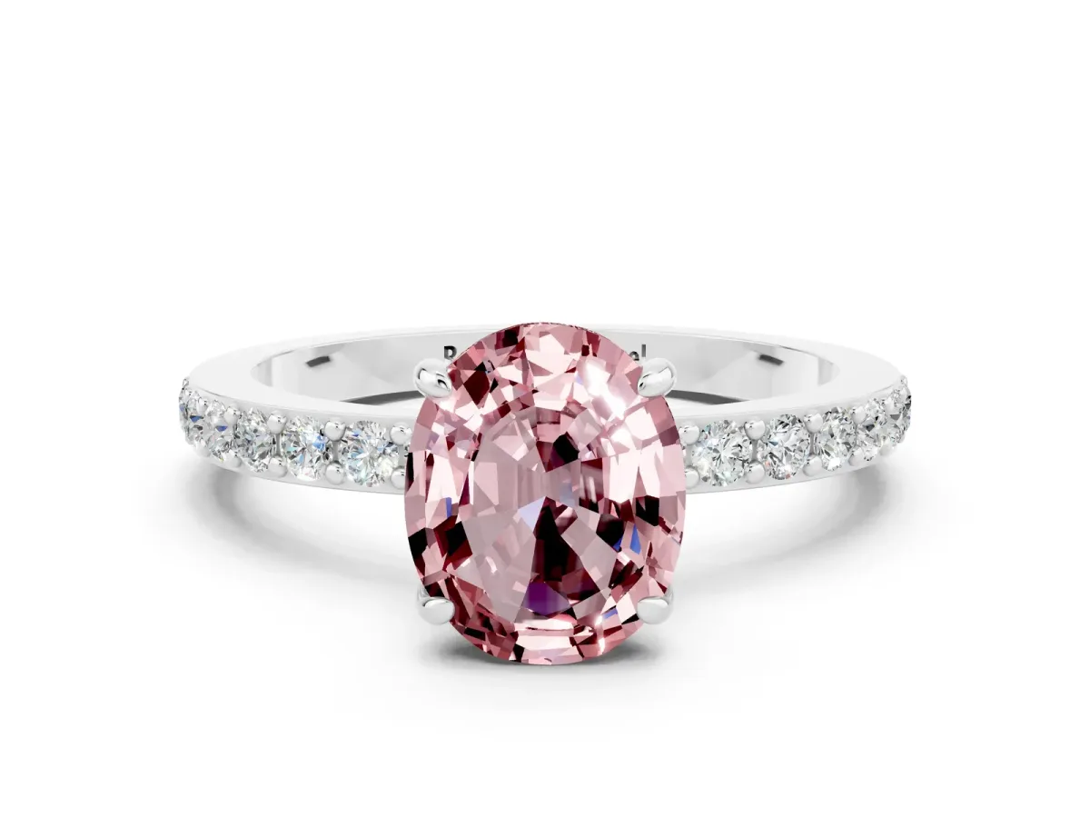 Oval Cut Morganite Solitaire Engagement Ring with Pavé Band and Four-Prong Setting Silver