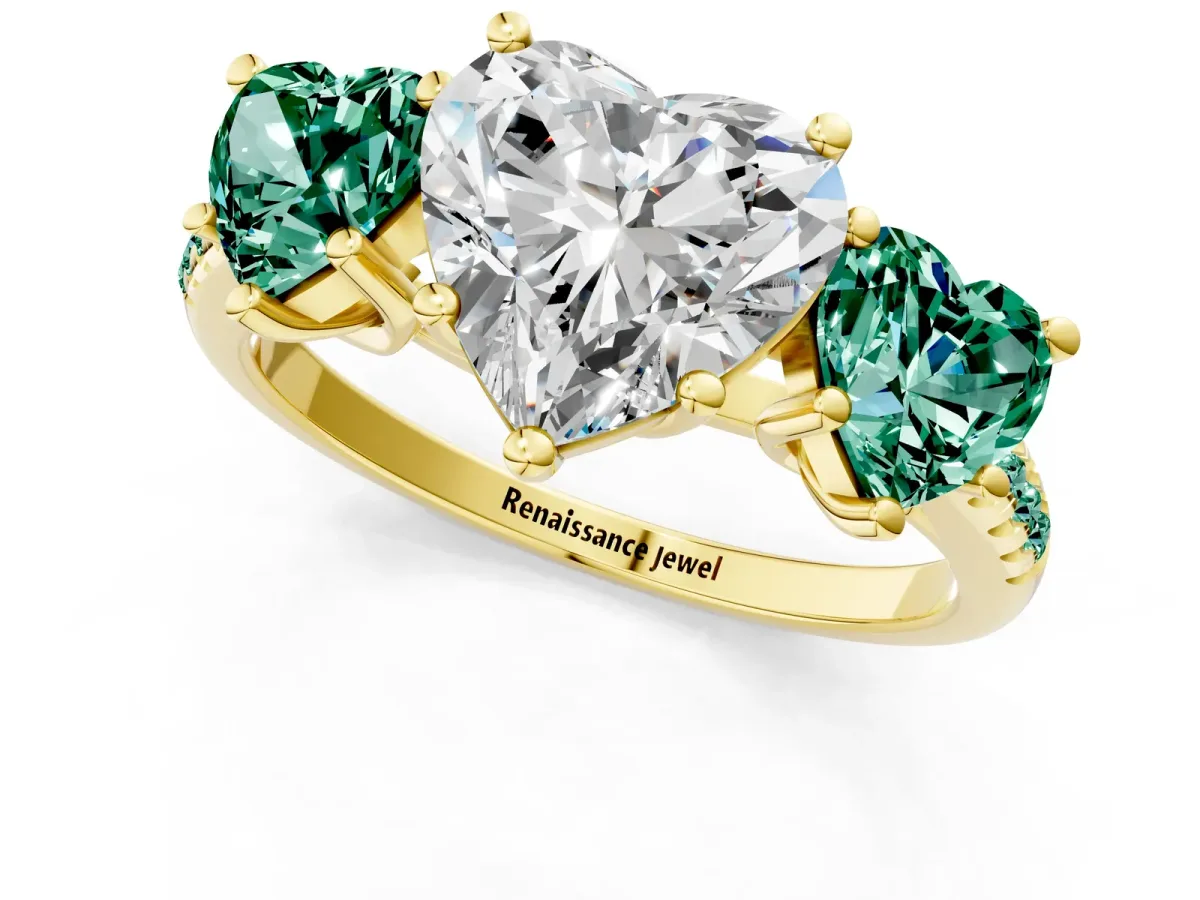 Three-Stone Heart Cut Diamond Ring with Round Green Sapphire Pavé Band and Prong Setting Yellow gold
