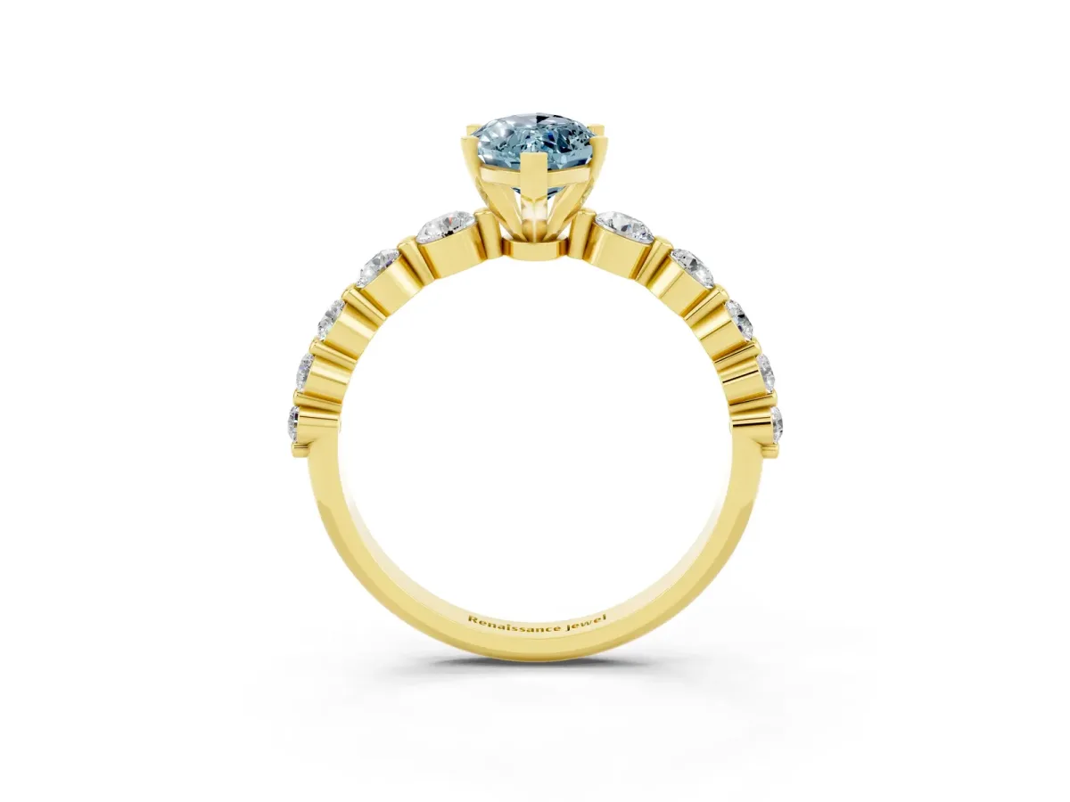 Marquise Cut Solitaire Aquamarine Ring with Pave Band and Four-Prong Setting Yellow gold