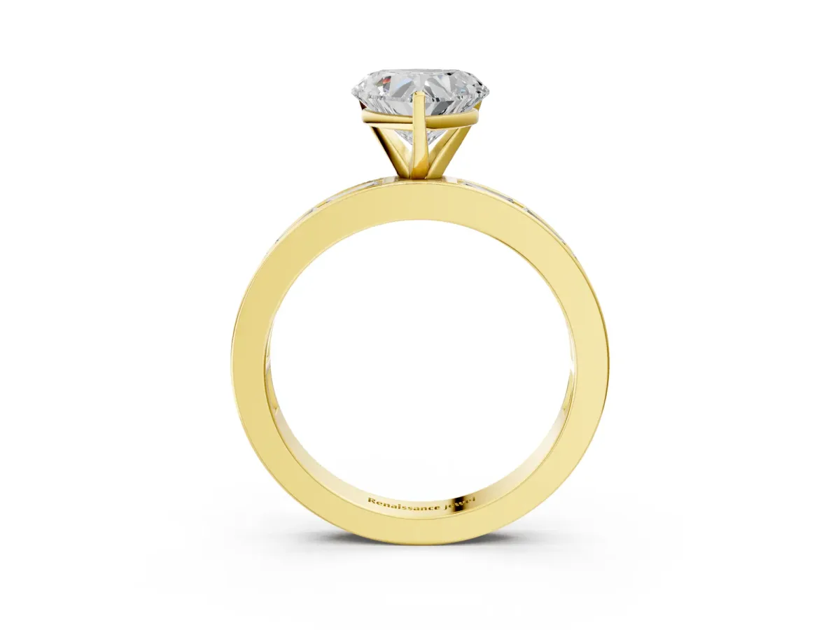 Heart Cut Solitaire Diamond Ring with Channel-Set Baguette Band and Four-Prong Setting Yellow gold