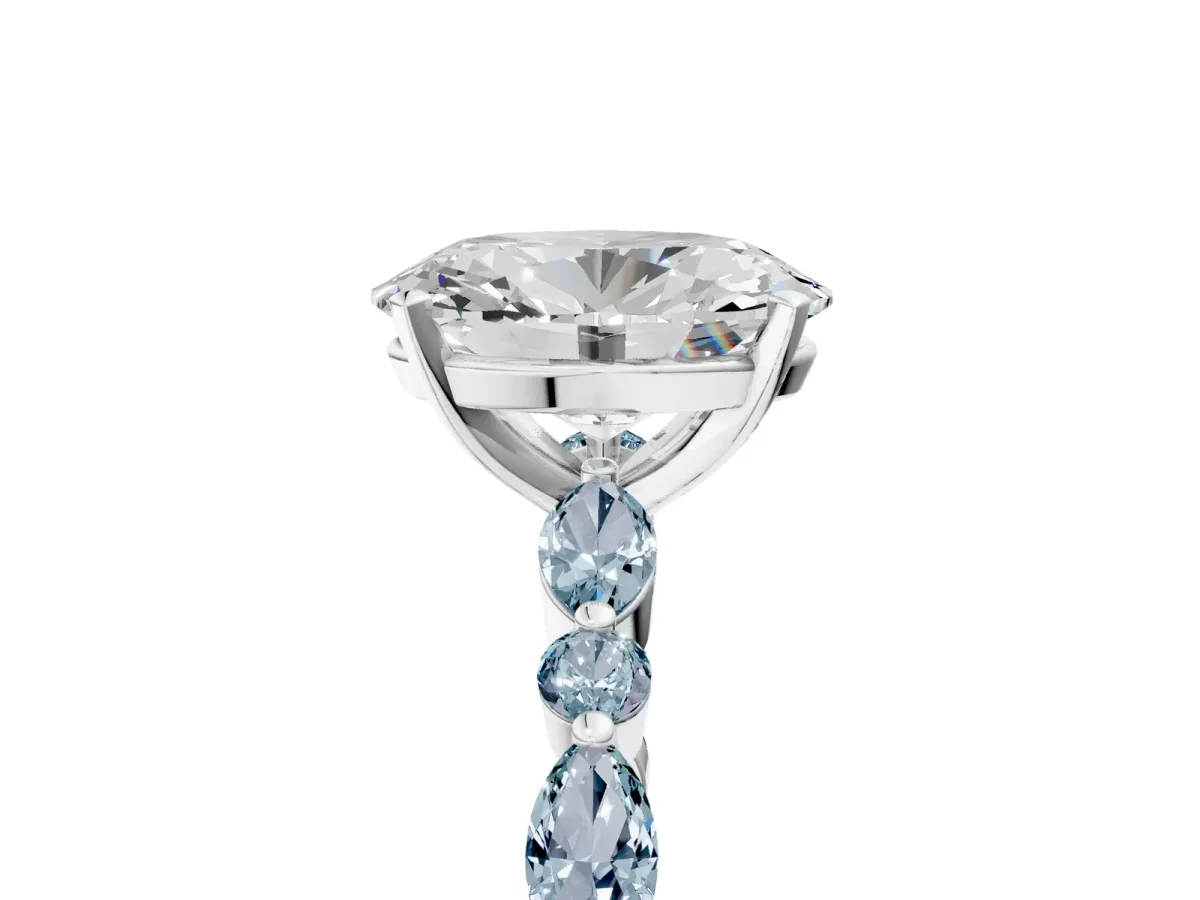 Oval Cut Diamond Ring with Marquise and Round Aquamarine Side Stones and Four-Prong Setting White gold