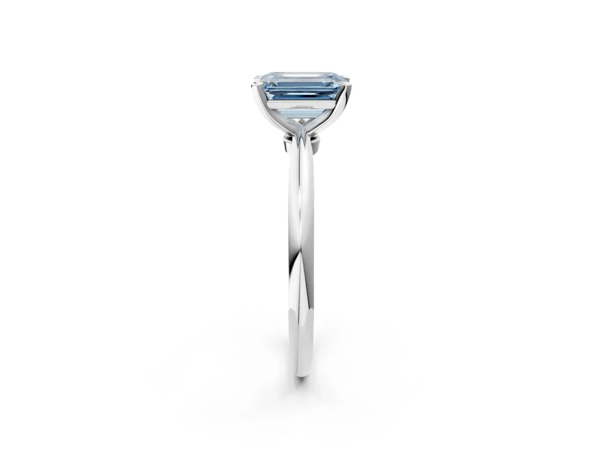 Fancy Blue Emerald Cut Diamond Solitaire Ring with Six-Prong Setting and Classic Band Platinum