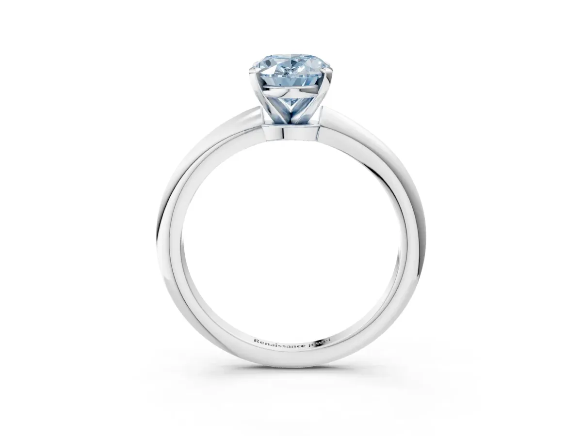Fancy Blue Oval Cut Diamond Solitaire Ring with Six-Prong Setting and Classic Band Silver